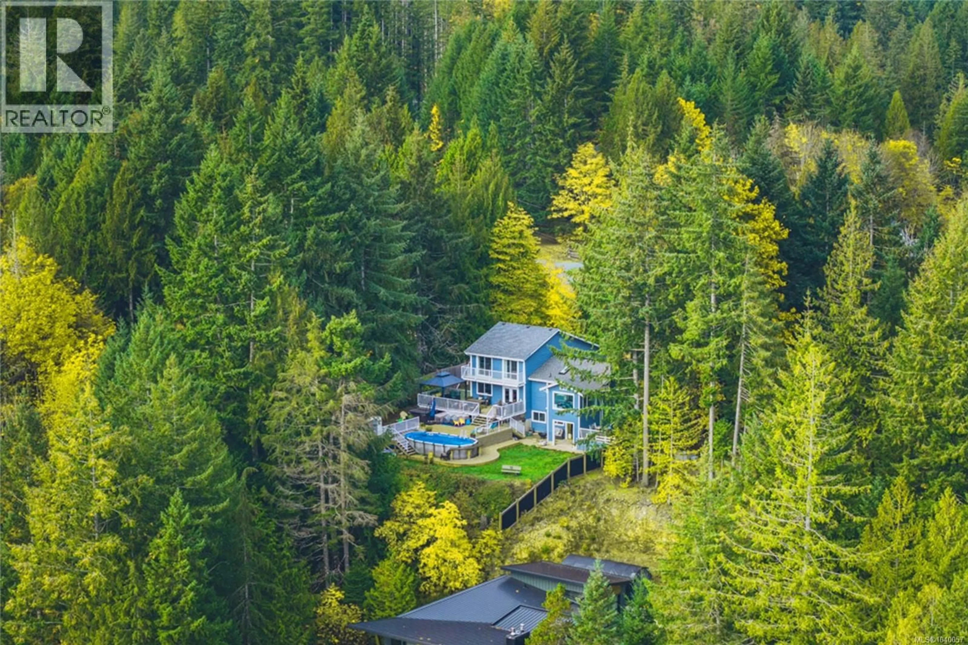A pic from outside/outdoor area/front of a property/back of a property/a pic from drone, forest/trees view for 10550 ASHER ROAD, Port Alberni British Columbia V9Y9A2