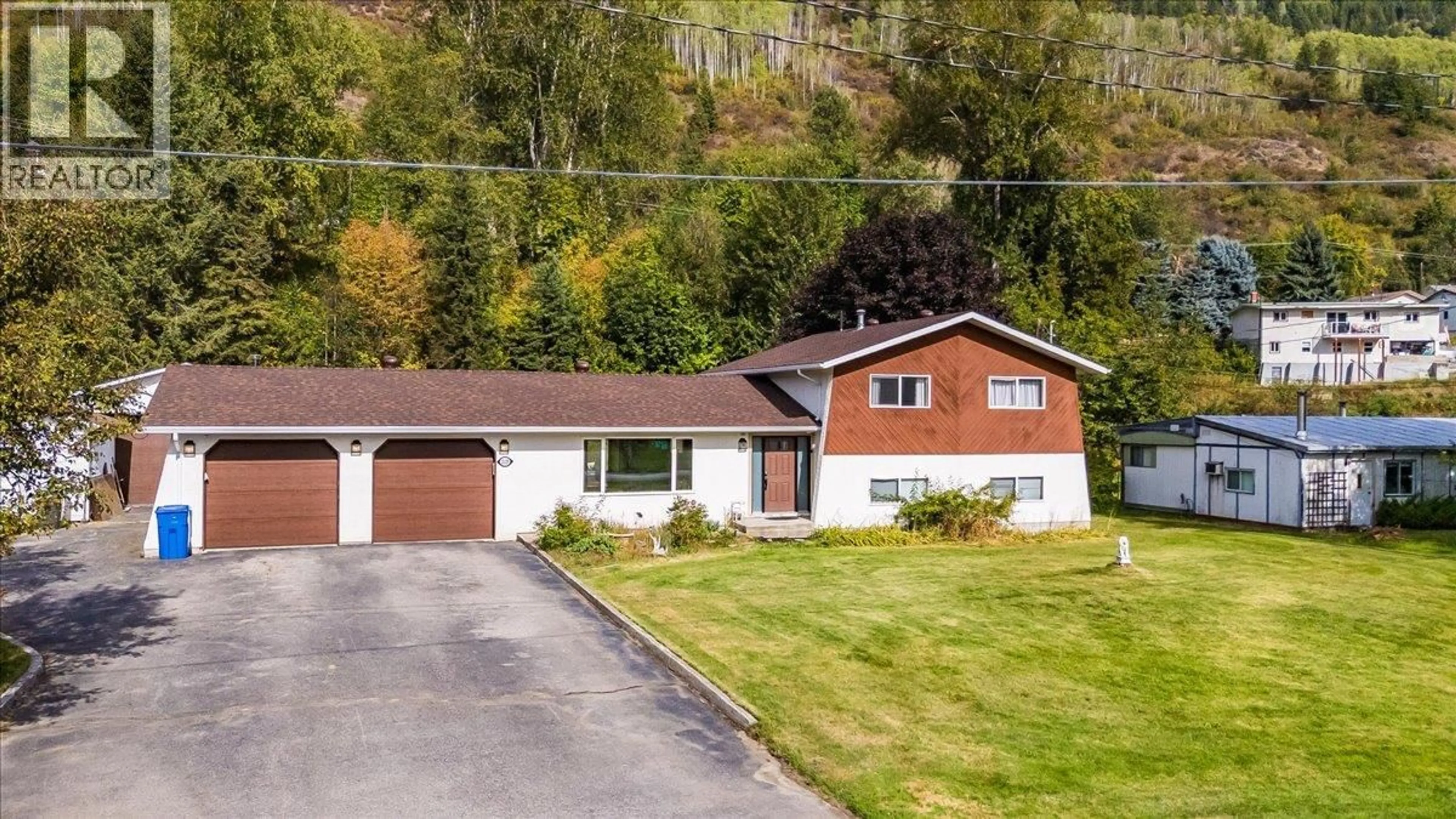 Home with vinyl exterior material, street for 2129 RASPBERRY ROAD, Castlegar British Columbia V1N4T6