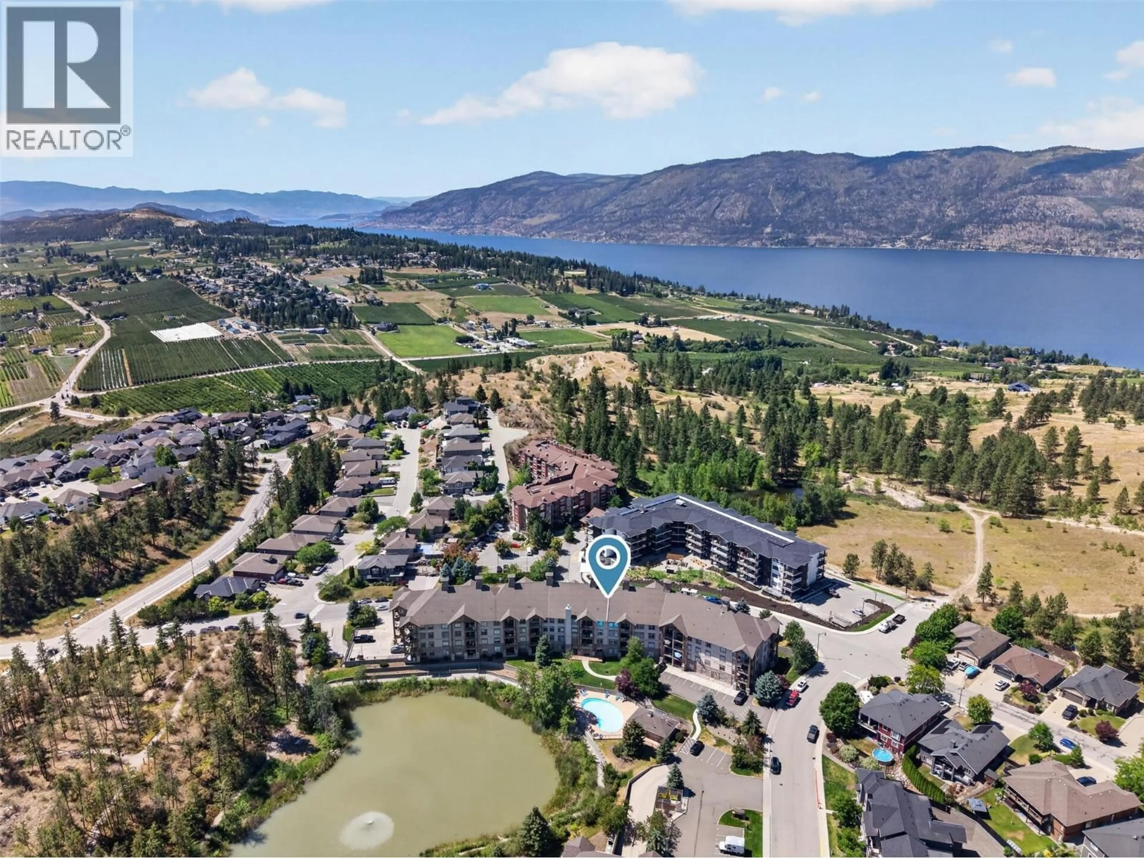 A pic from outside/outdoor area/front of a property/back of a property/a pic from drone, water/lake/river/ocean view for 208 - 2551 SHORELINE DRIVE, Lake Country British Columbia V1V2P2
