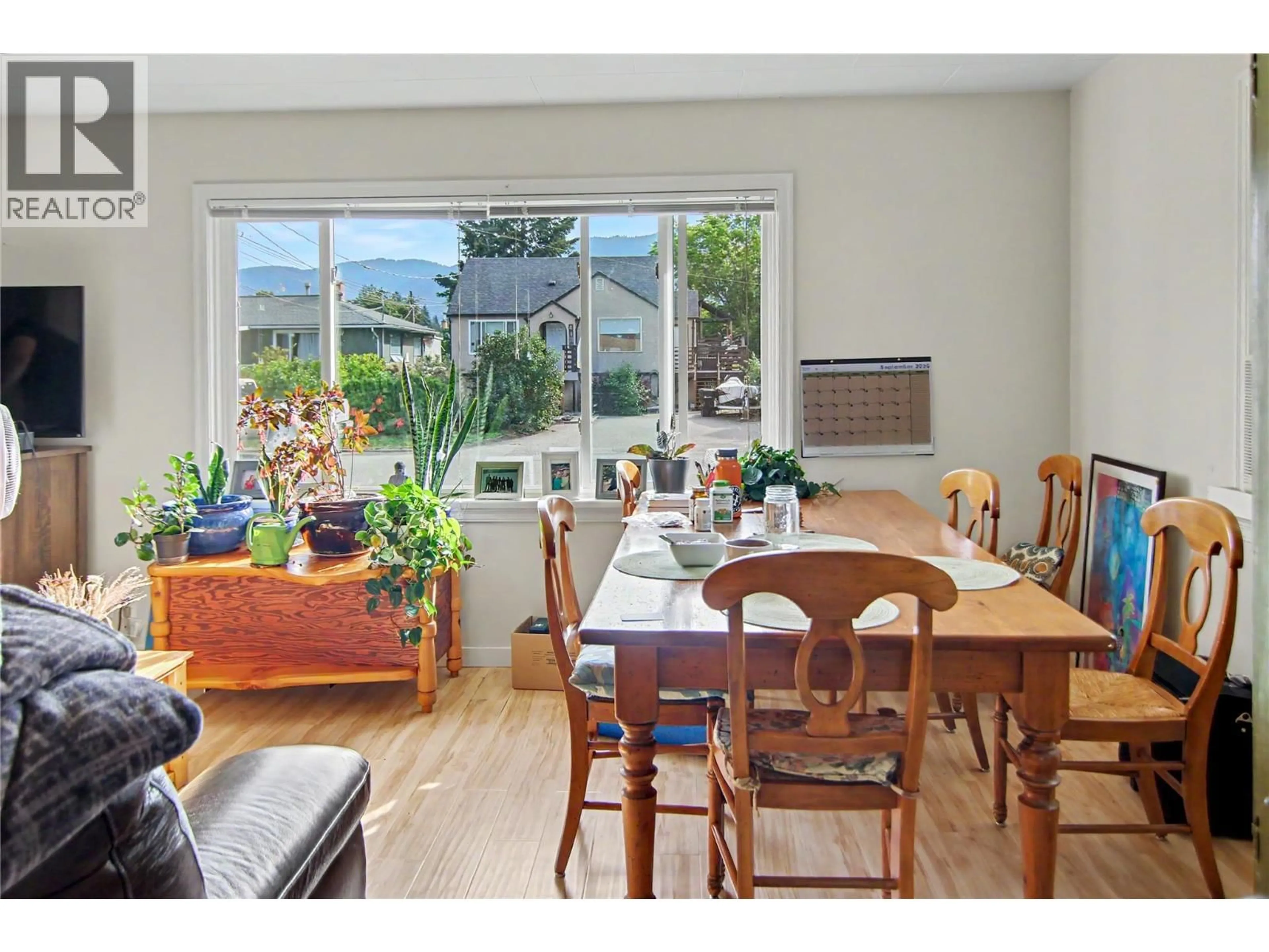 Dining room, wood/laminate floor for 4404 25 STREET, Vernon British Columbia V1T4S6