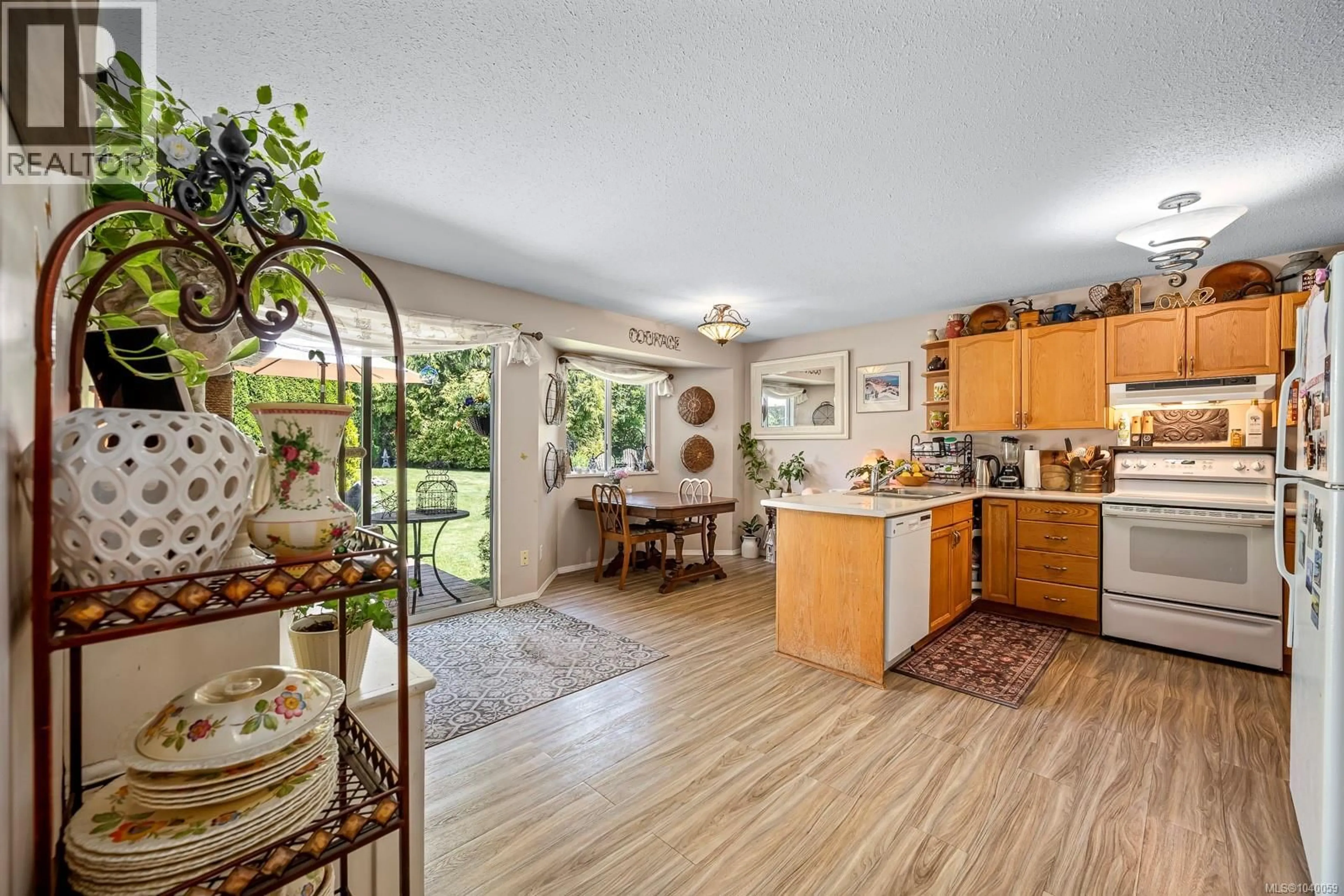 Open concept kitchen, ceramic/tile floor for 2115 DRAKE PLACE, Courtenay British Columbia V9N8Y8