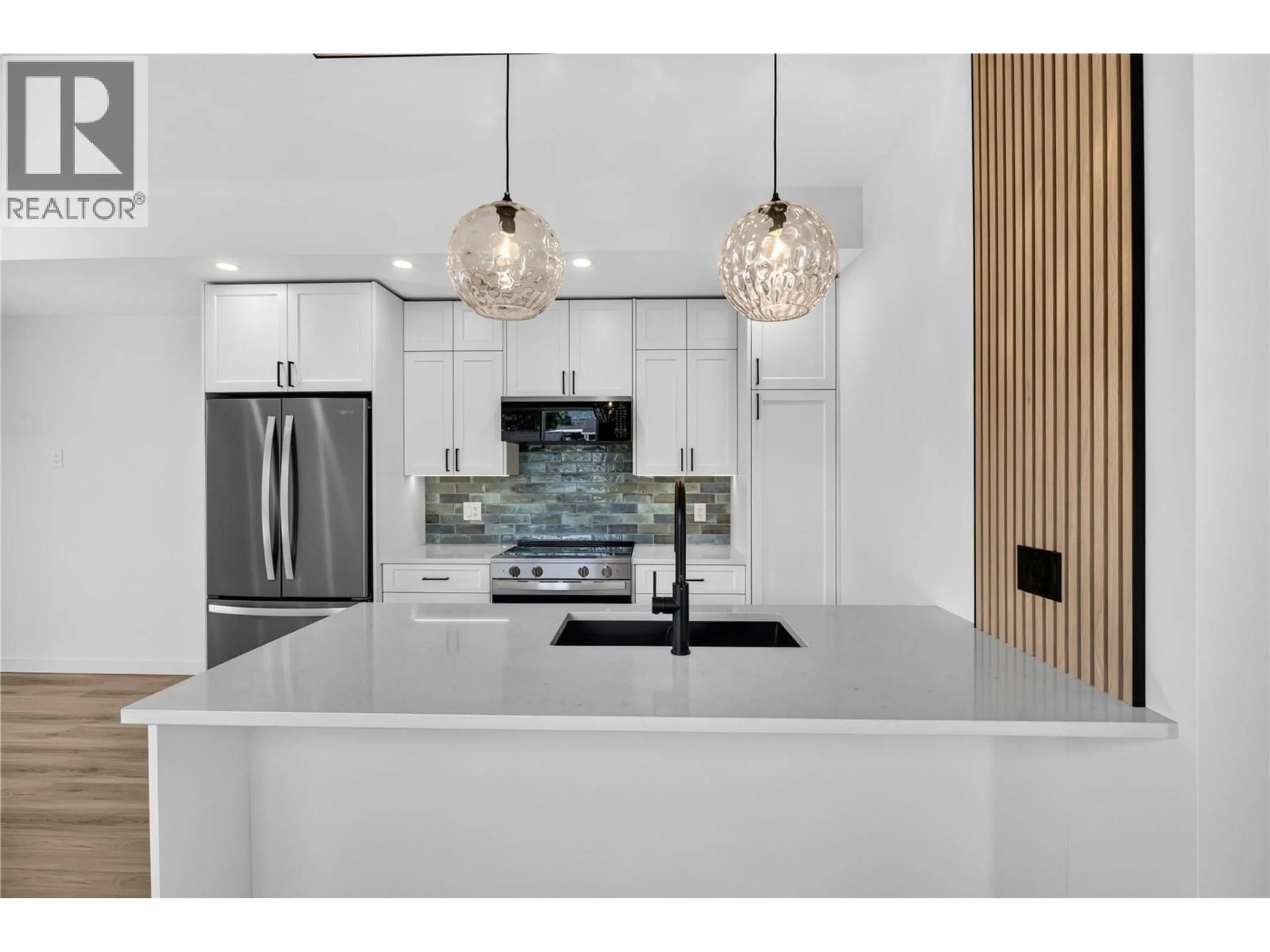Open concept kitchen, ceramic/tile floor for 103 - 424 BENNETT AVENUE, Penticton British Columbia V2A2P6