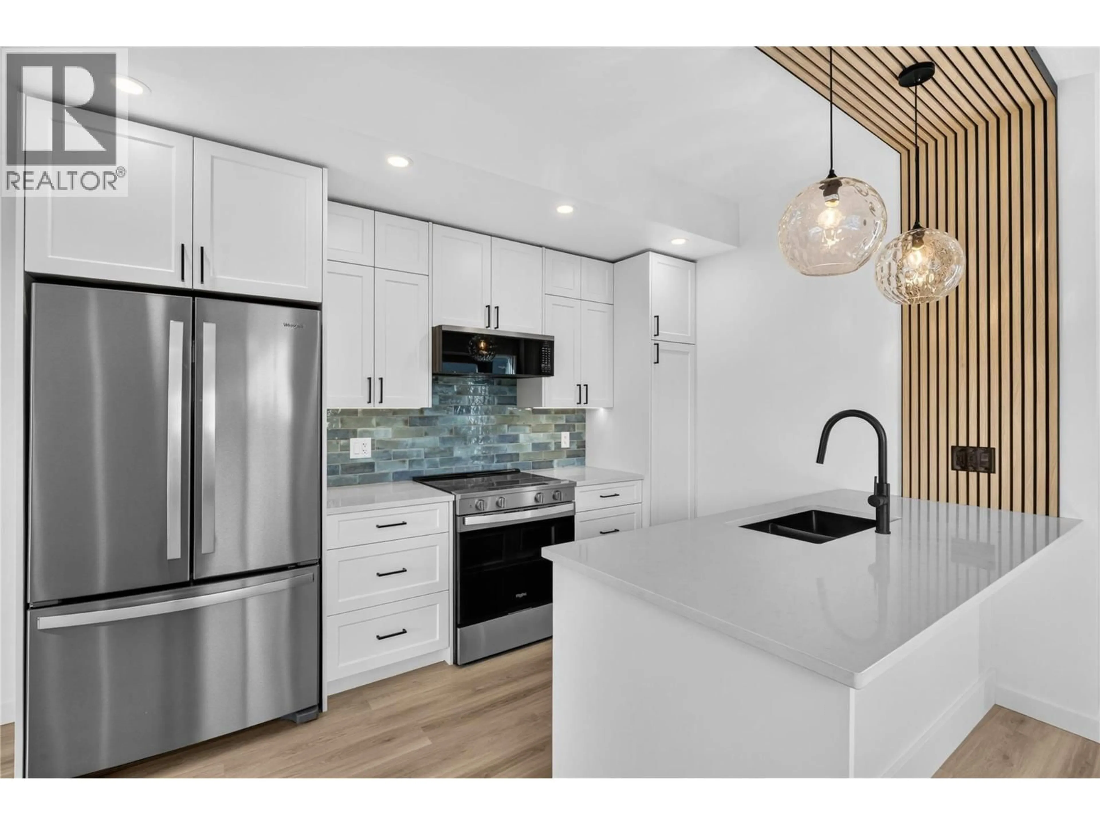 Open concept kitchen, unknown for 103 - 424 BENNETT AVENUE, Penticton British Columbia V2A2P6