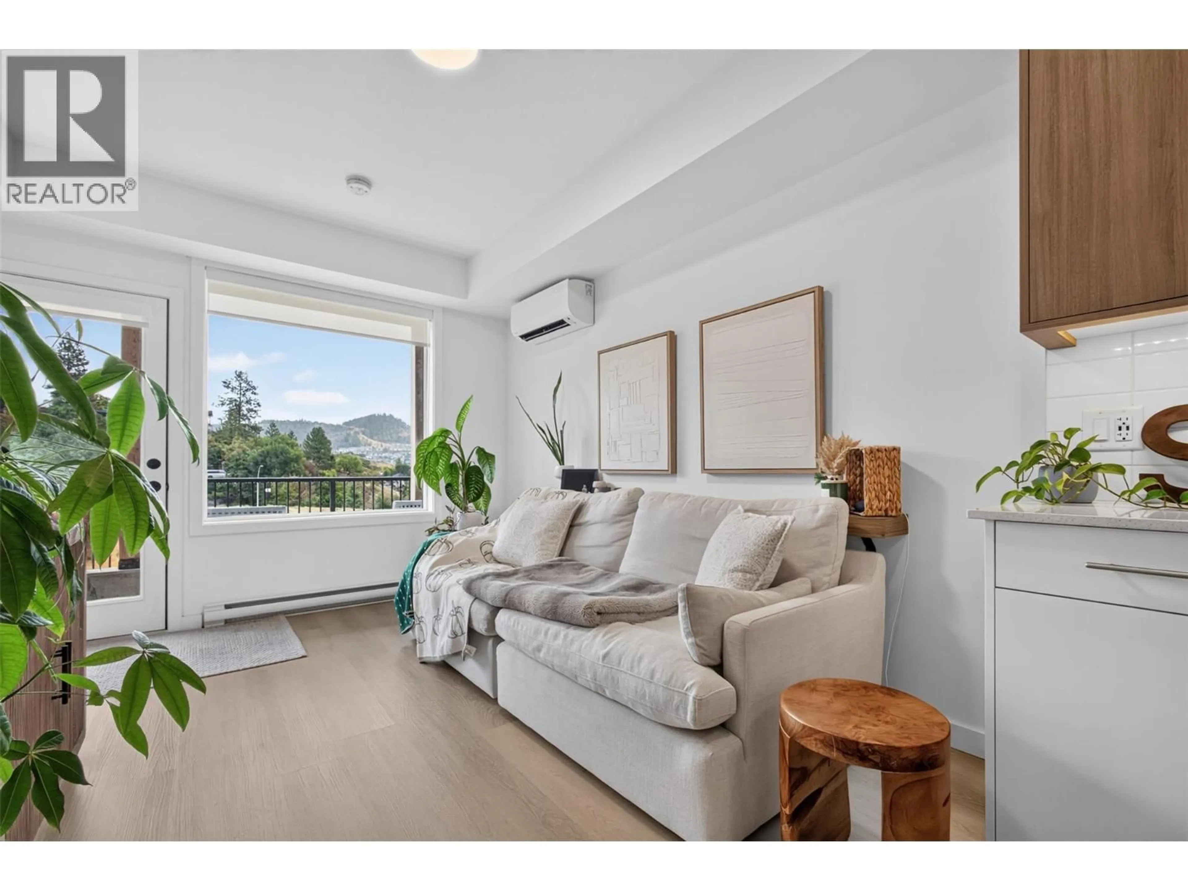 Living room with furniture, unknown for 67 - 685 BOYNTON PLACE, Kelowna British Columbia V1V2Z4