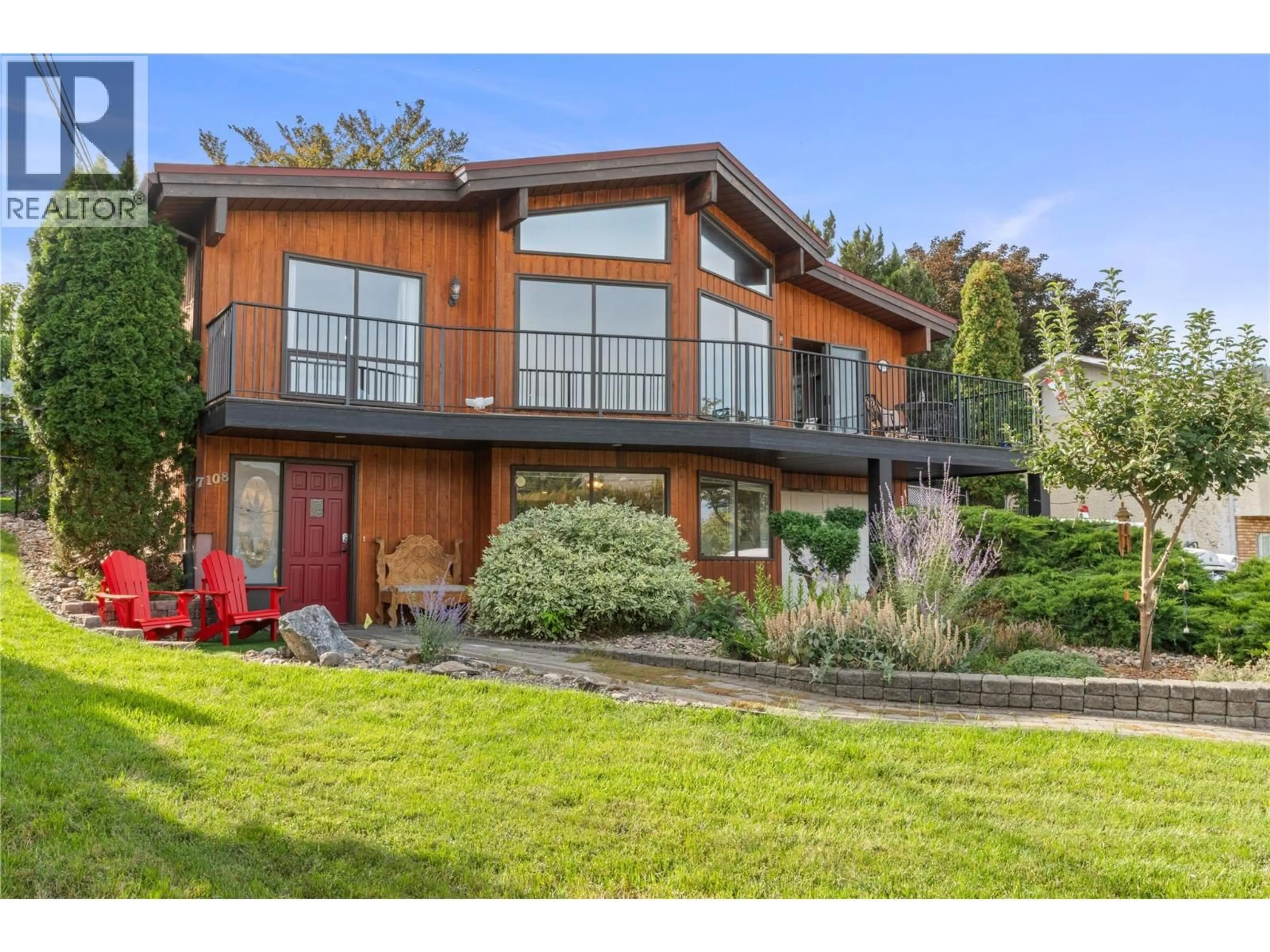 Home with brick exterior material, unknown for 7108 LONGACRE DRIVE, Vernon British Columbia V1H1H6