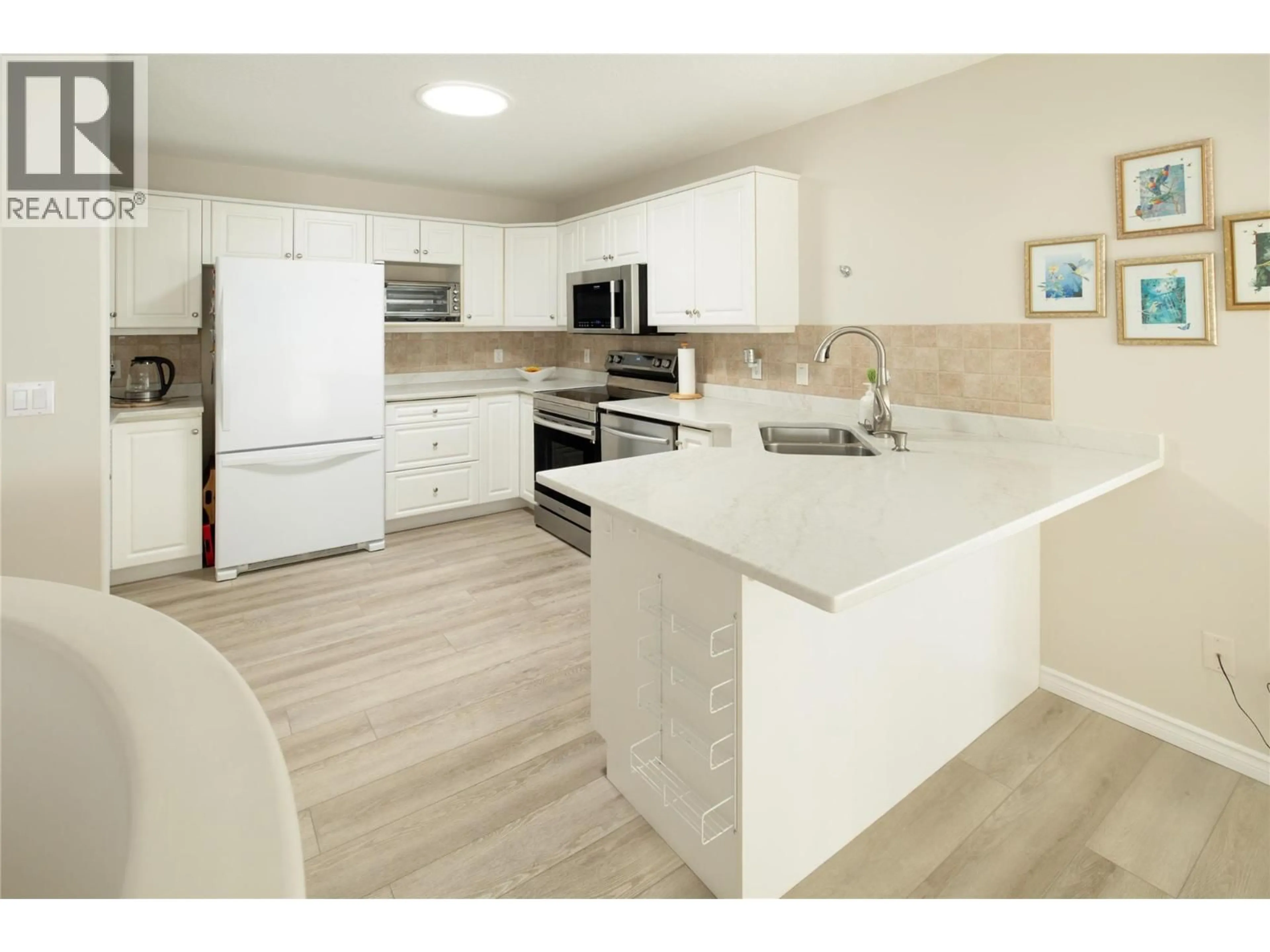 Open concept kitchen, unknown for 203 - 5300 HUSTON ROAD, Peachland British Columbia V0H1X2