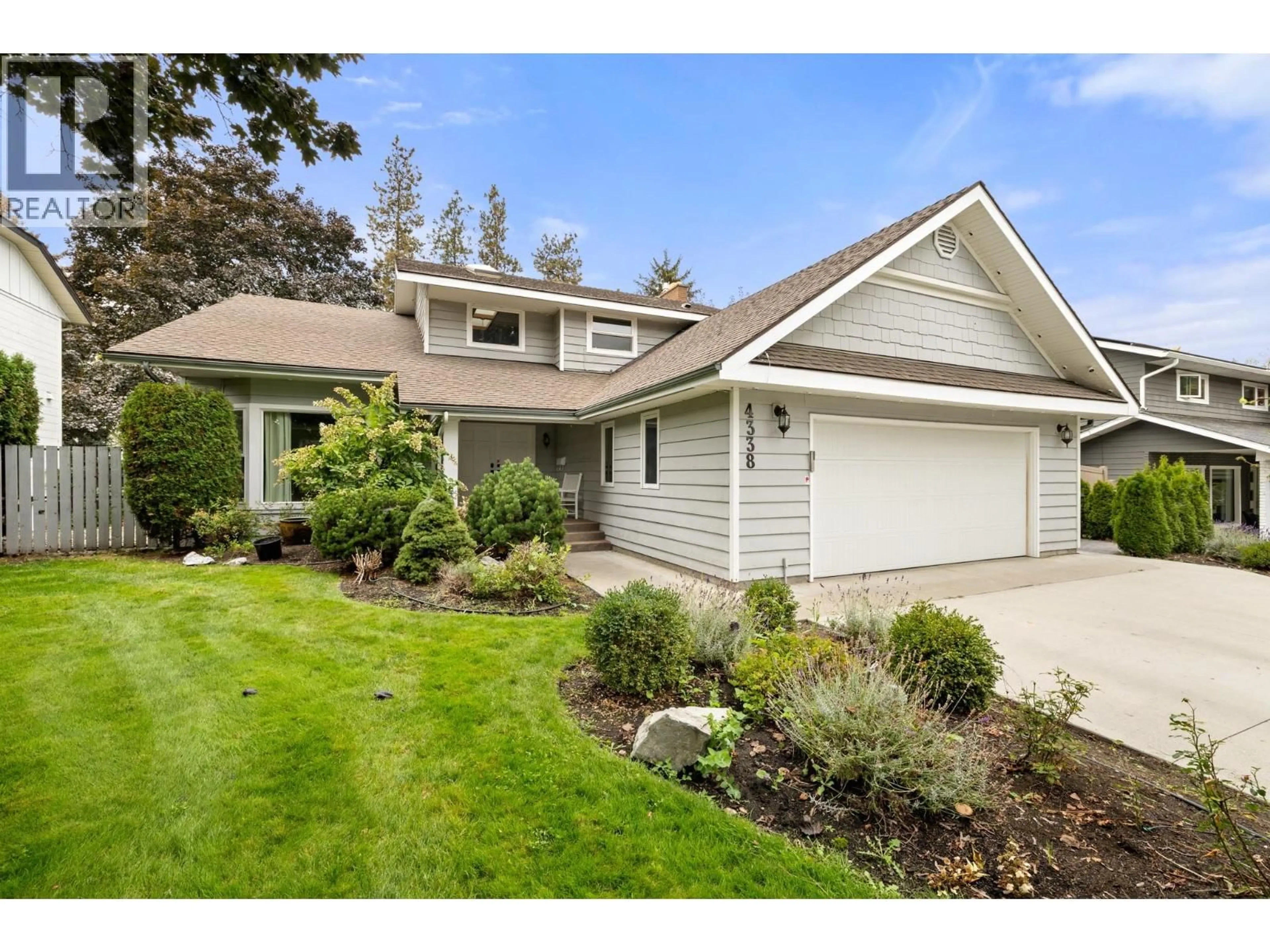 Home with vinyl exterior material, street for 4338 DUNVEGAN COURT, Kelowna British Columbia V1W2N6