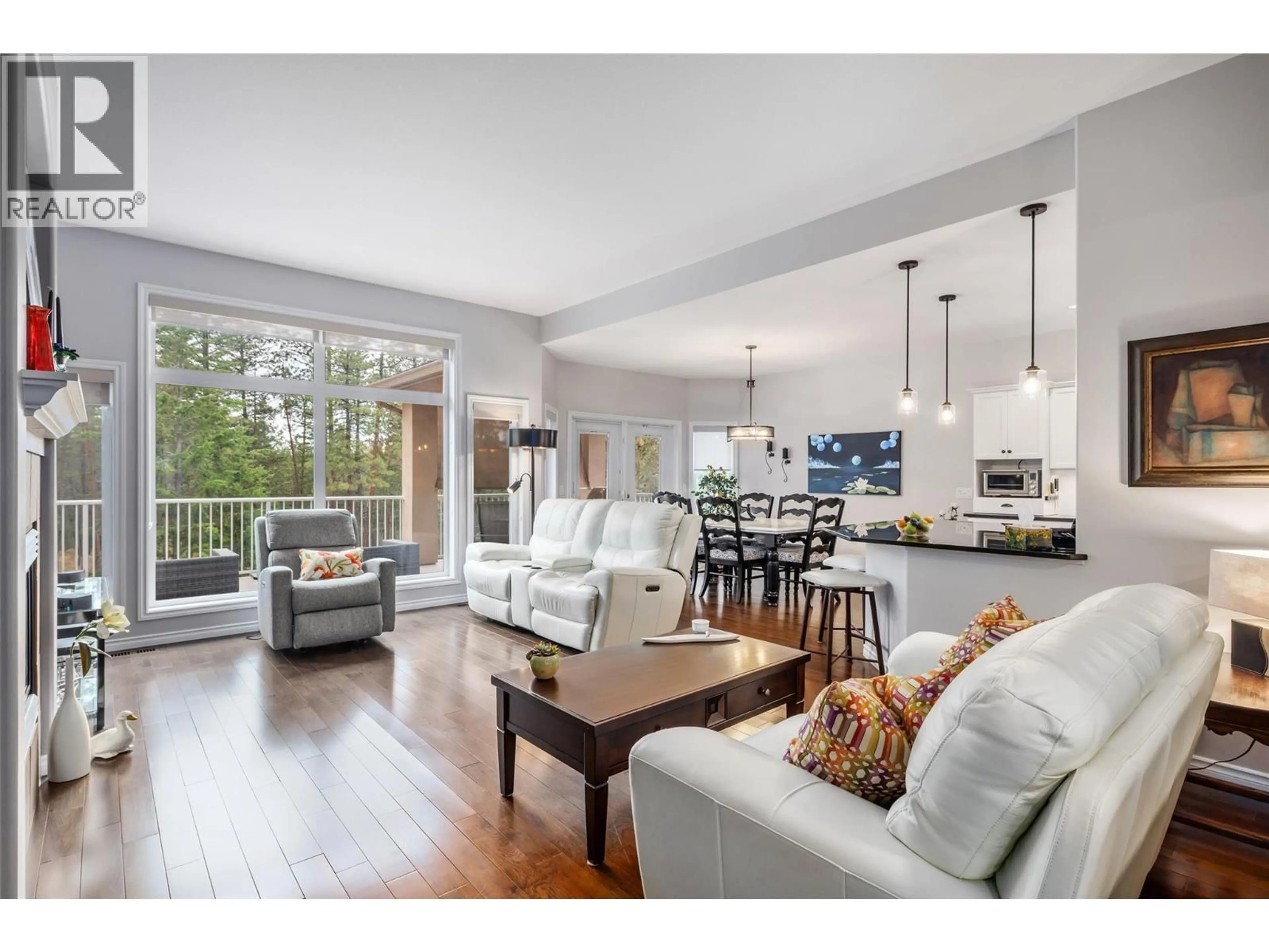 Open concept kitchen, wood/laminate floor for 4170 GALLAGHERS FOREST SOUTH CRESCENT, Kelowna British Columbia V1W5E4