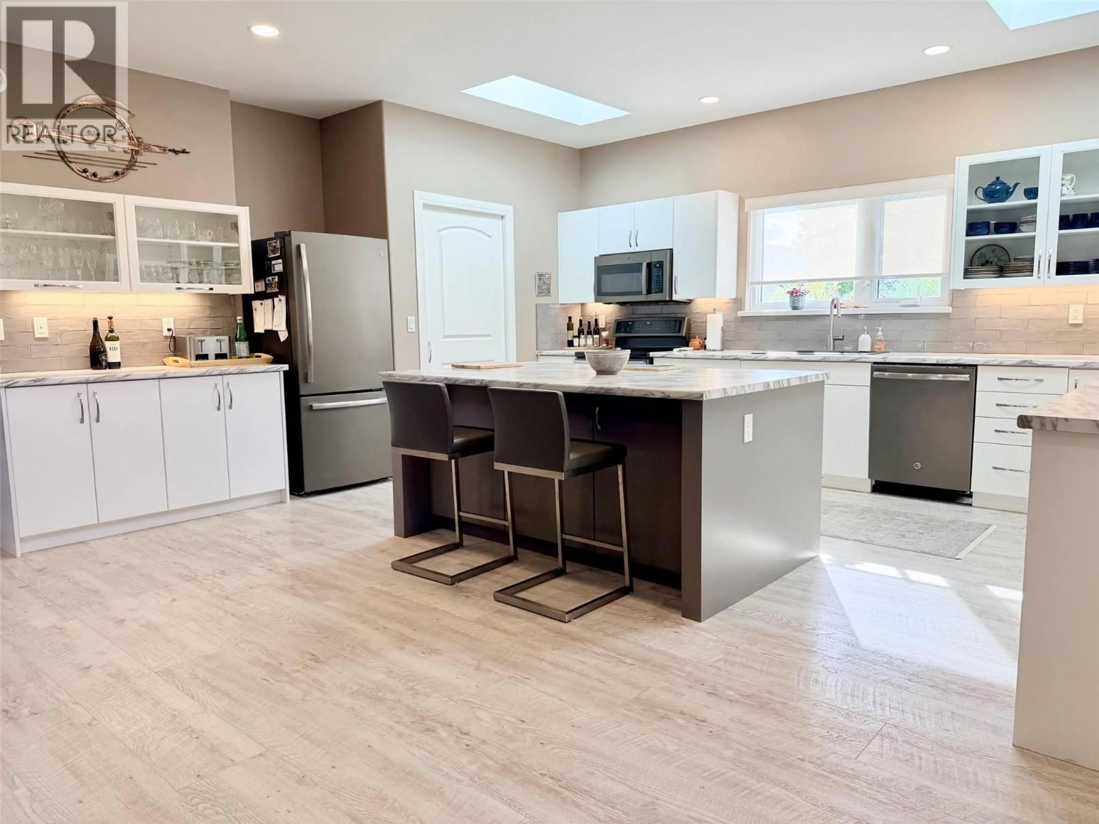 Open concept kitchen, ceramic/tile floor for 1724 ALDER STREET, Creston British Columbia V0B1G5
