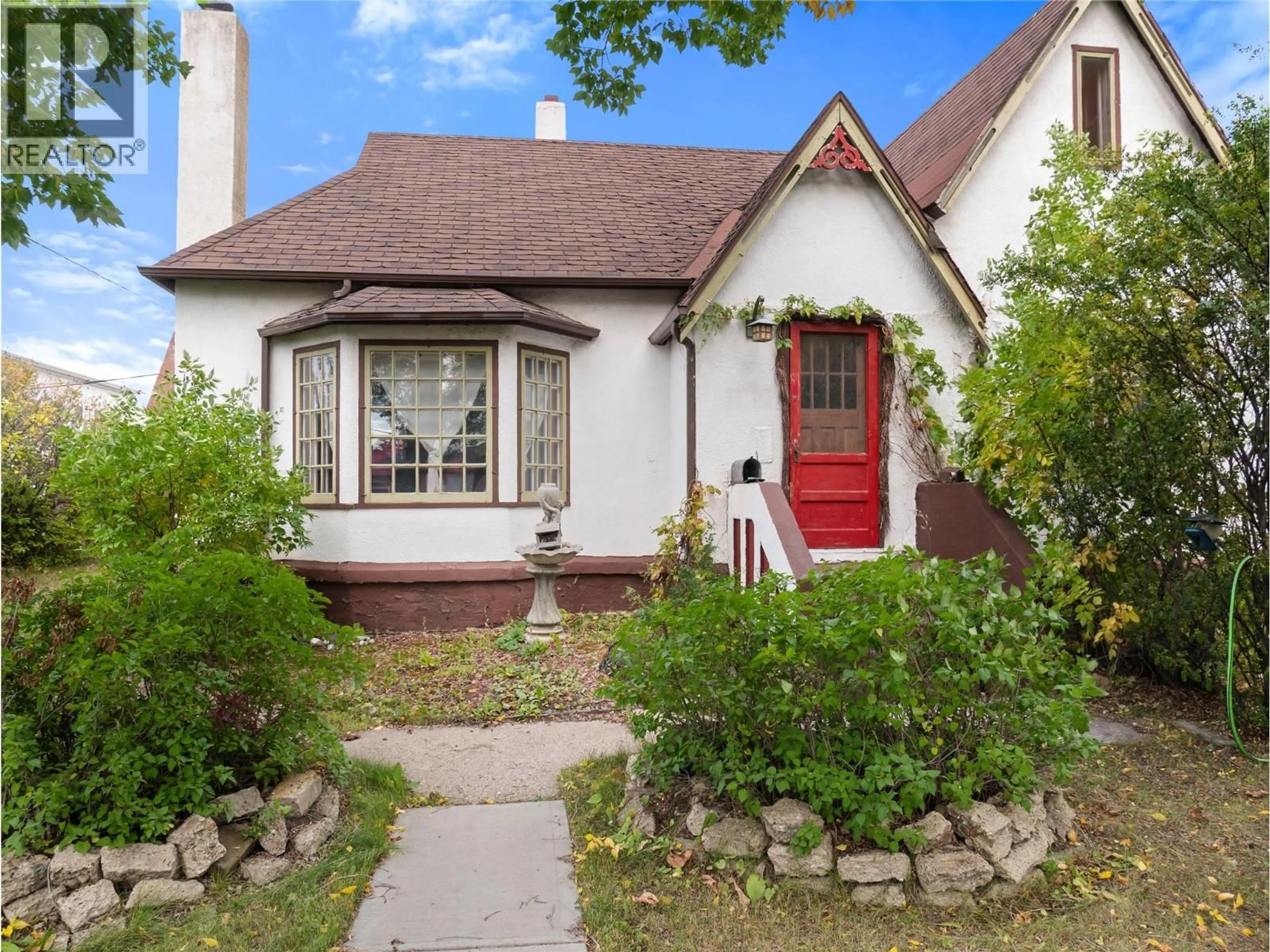 Home with brick exterior material, street for 844 104 AVENUE, Dawson Creek British Columbia V1G2H5