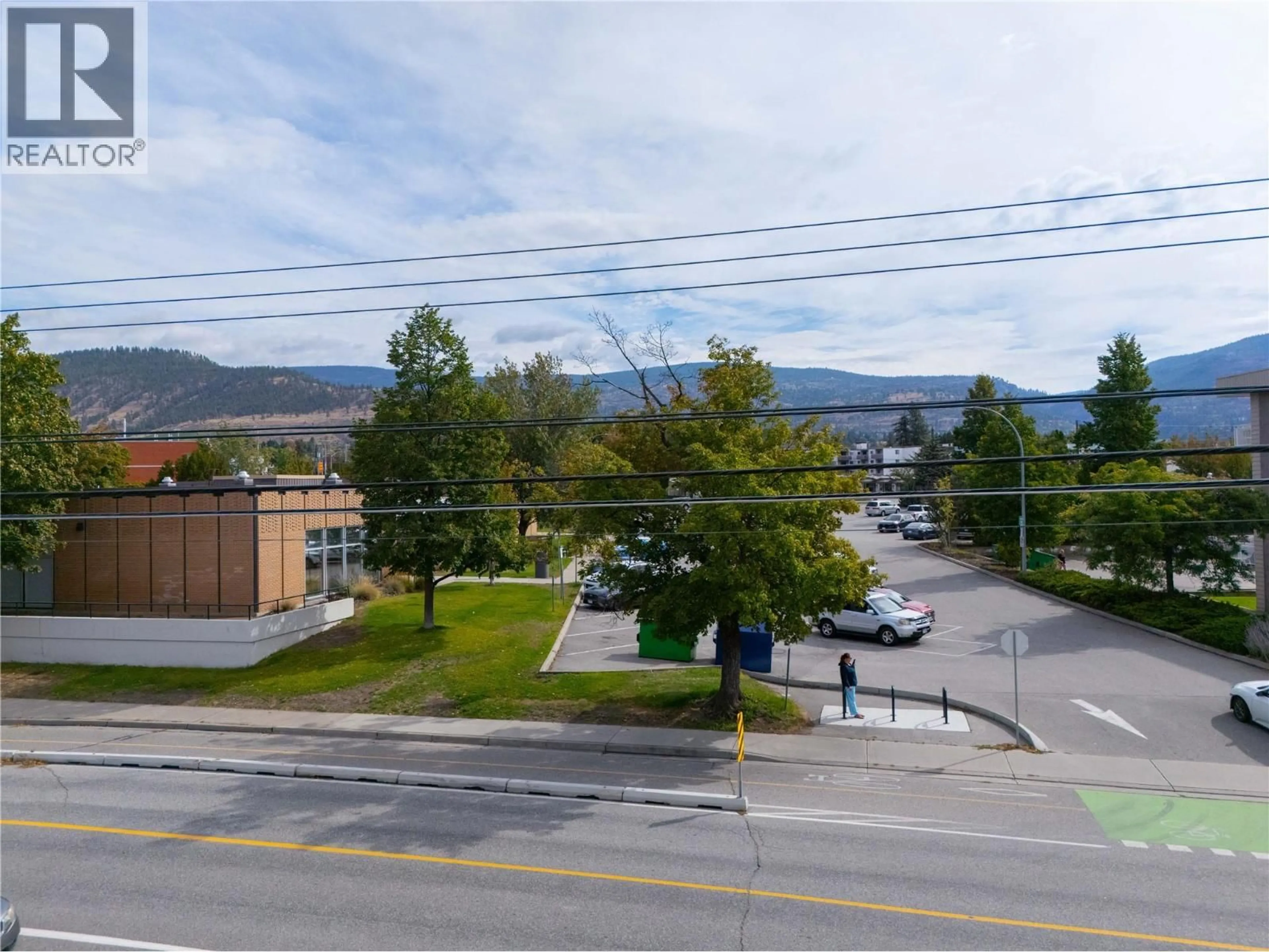 A pic from outside/outdoor area/front of a property/back of a property/a pic from drone, mountain view for 301 - 803 FAIRVIEW ROAD, Penticton British Columbia V2A5Y7