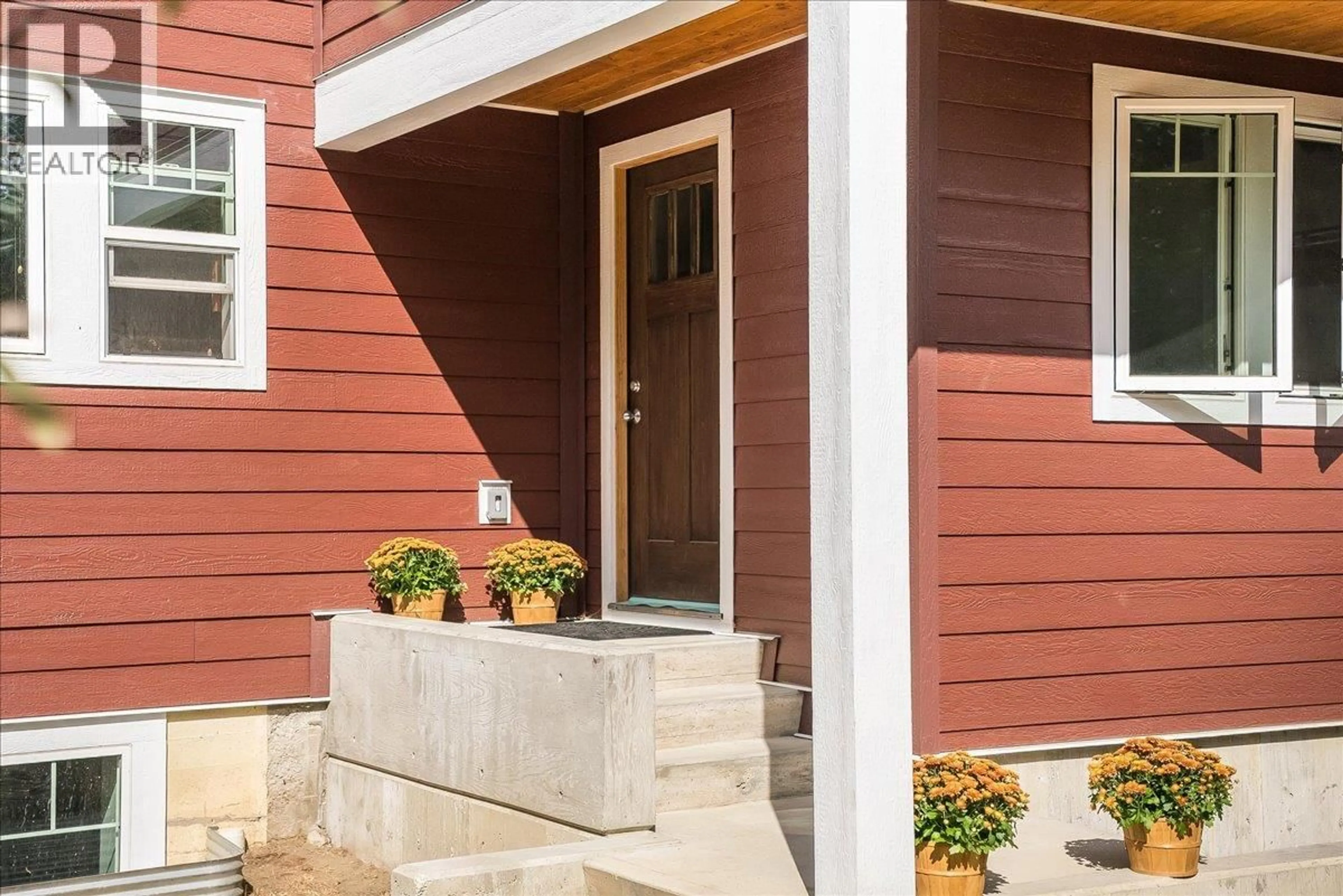 Home with vinyl exterior material, street for 2460 FOURTH AVENUE, Rossland British Columbia V0G1Y0