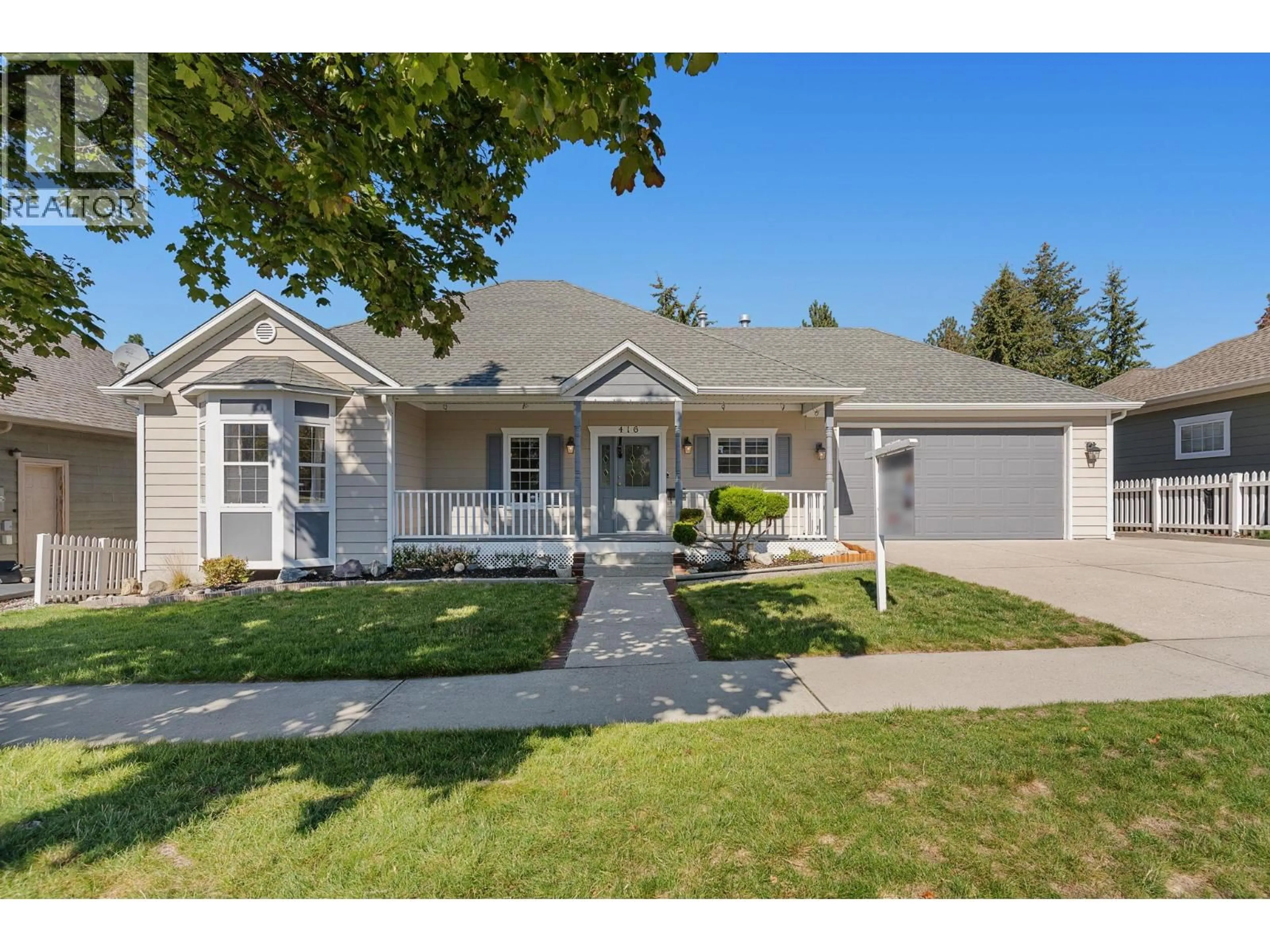 Home with vinyl exterior material, street for 416 QUILCHENA DRIVE, Kelowna British Columbia V1W4T7