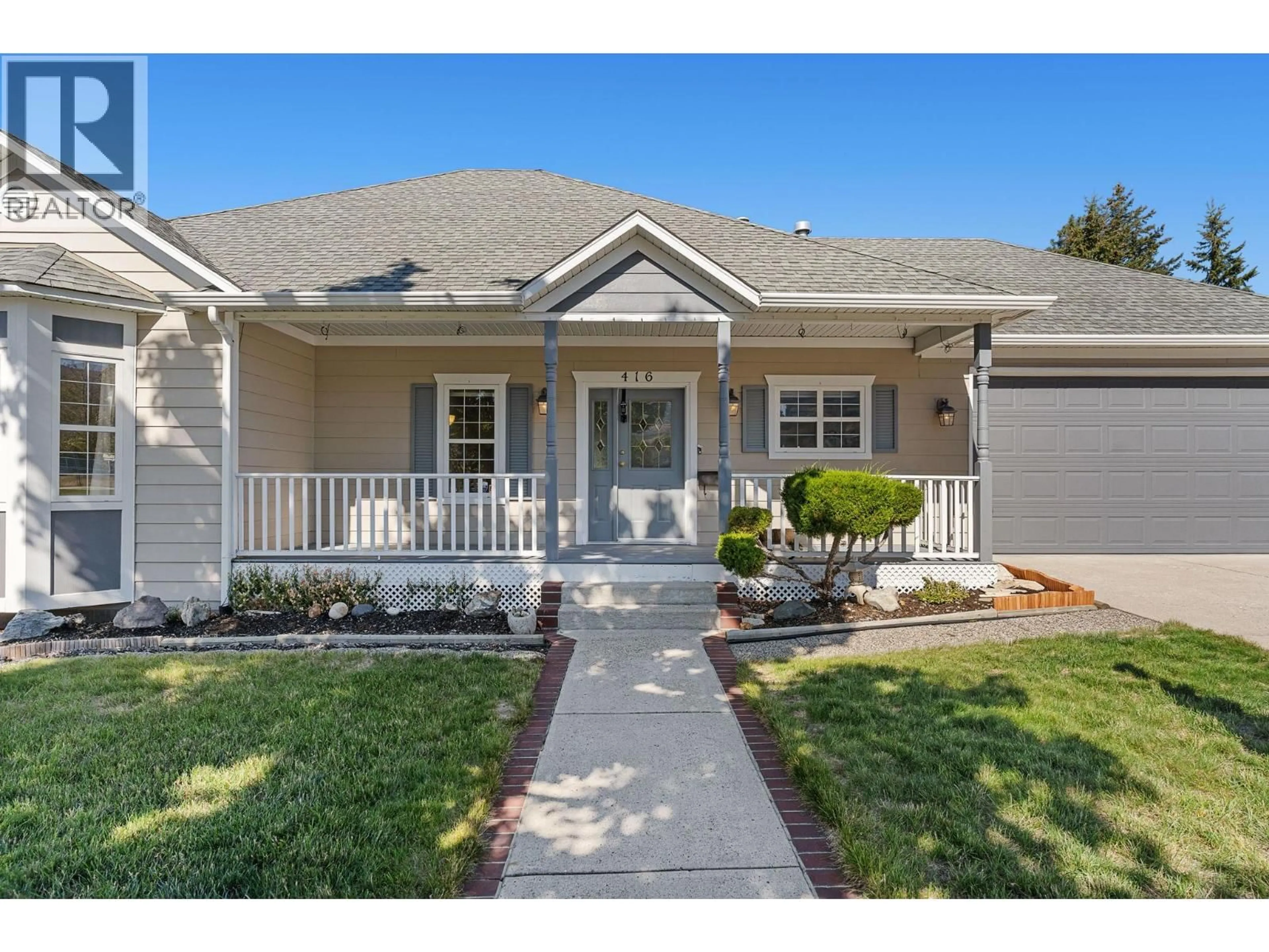 Home with vinyl exterior material, street for 416 QUILCHENA DRIVE, Kelowna British Columbia V1W4T7