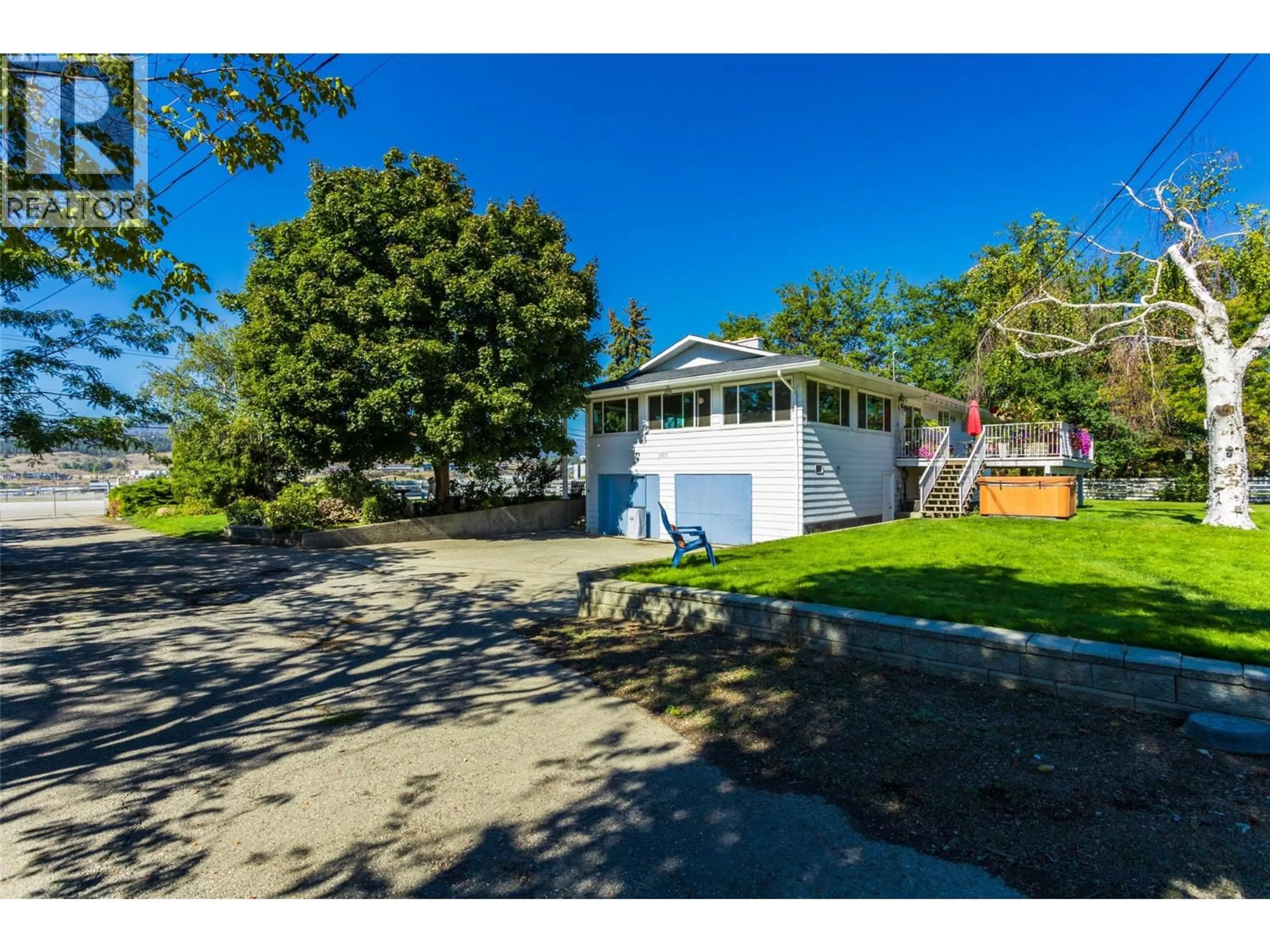 A pic from outside/outdoor area/front of a property/back of a property/a pic from drone, street for 4781 OLD VERNON ROAD, Kelowna British Columbia V1X7V6