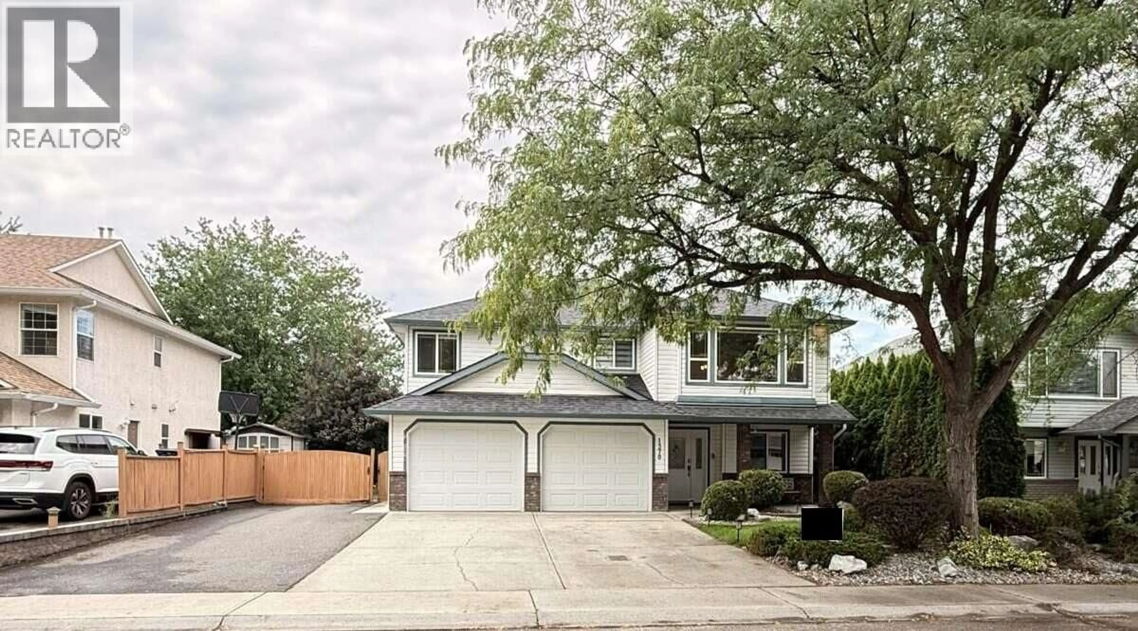 Home with vinyl exterior material, street for 1370 FRIESEN ROAD, Kelowna British Columbia V1X7P2