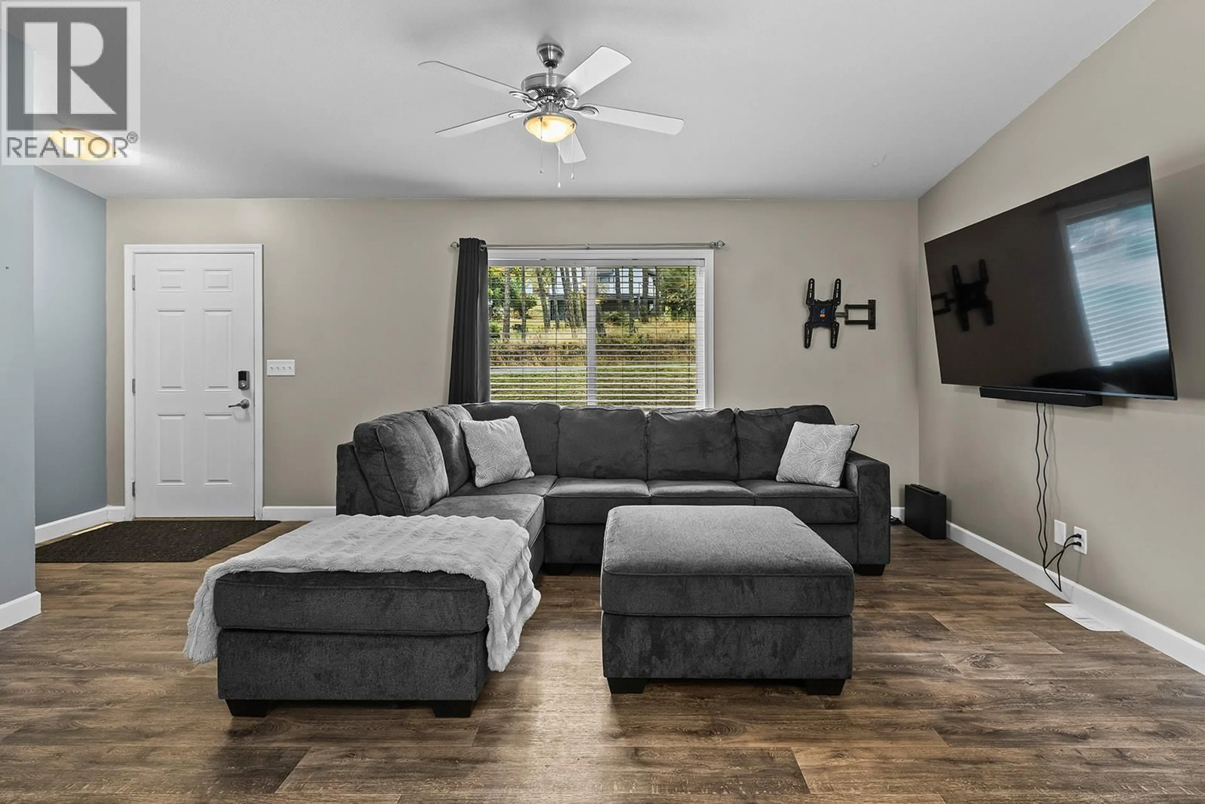 Living room with furniture, unknown for 7867 ALPINE ROAD, Kelowna British Columbia V1Z3V4