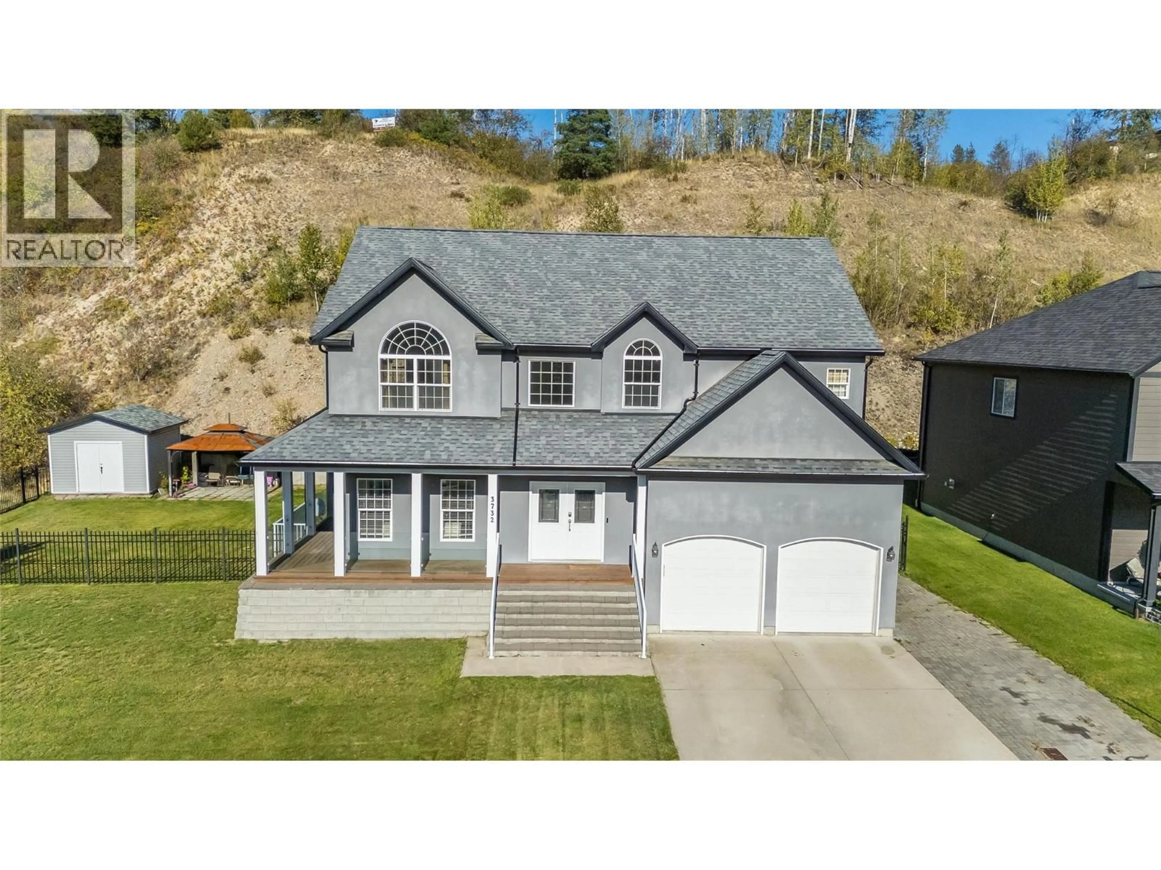 A pic from outside/outdoor area/front of a property/back of a property/a pic from drone, street for 3732 5TH AVENUE, Castlegar British Columbia V1N4Y4