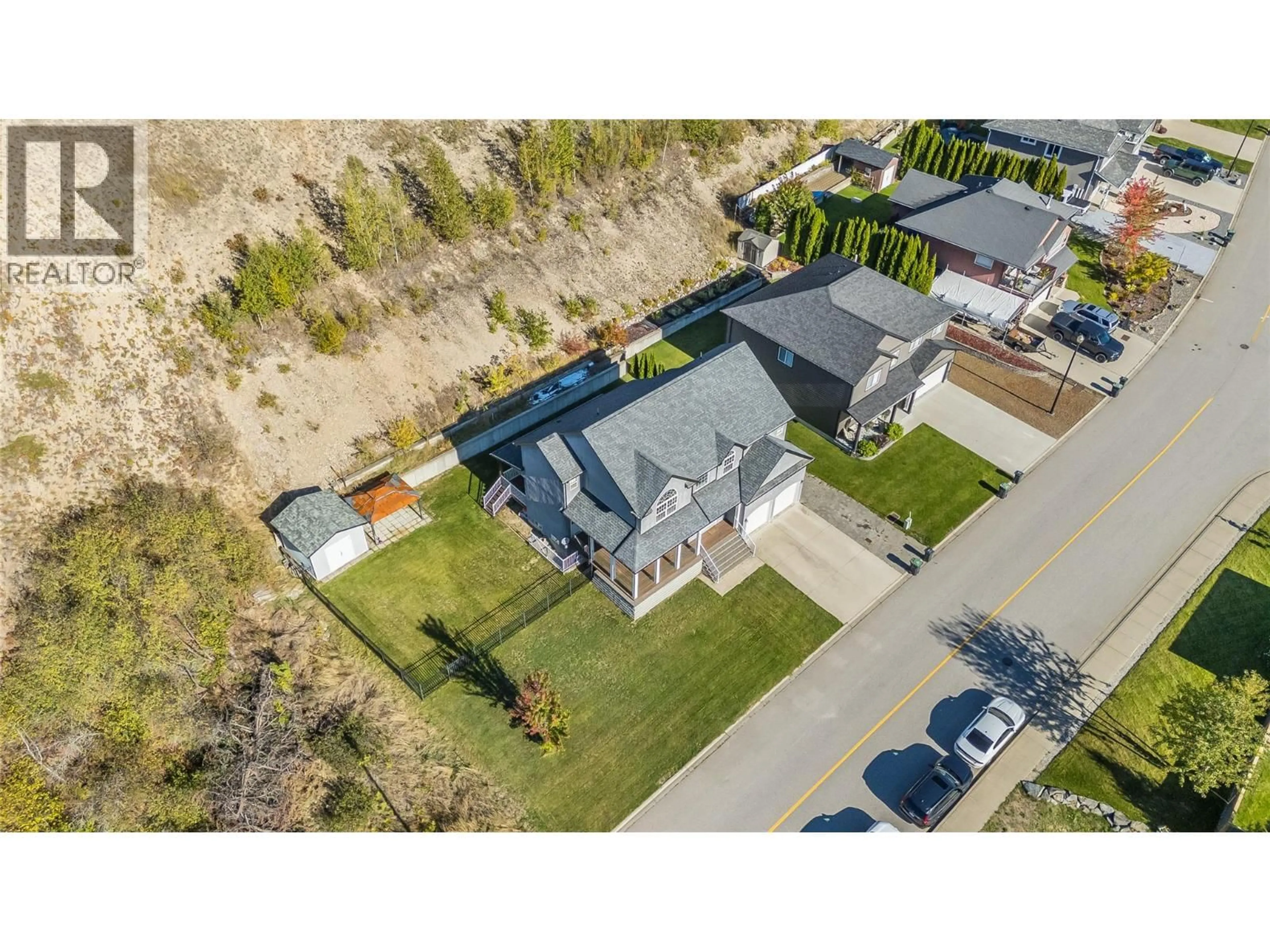 A pic from outside/outdoor area/front of a property/back of a property/a pic from drone, street for 3732 5TH AVENUE, Castlegar British Columbia V1N4Y4