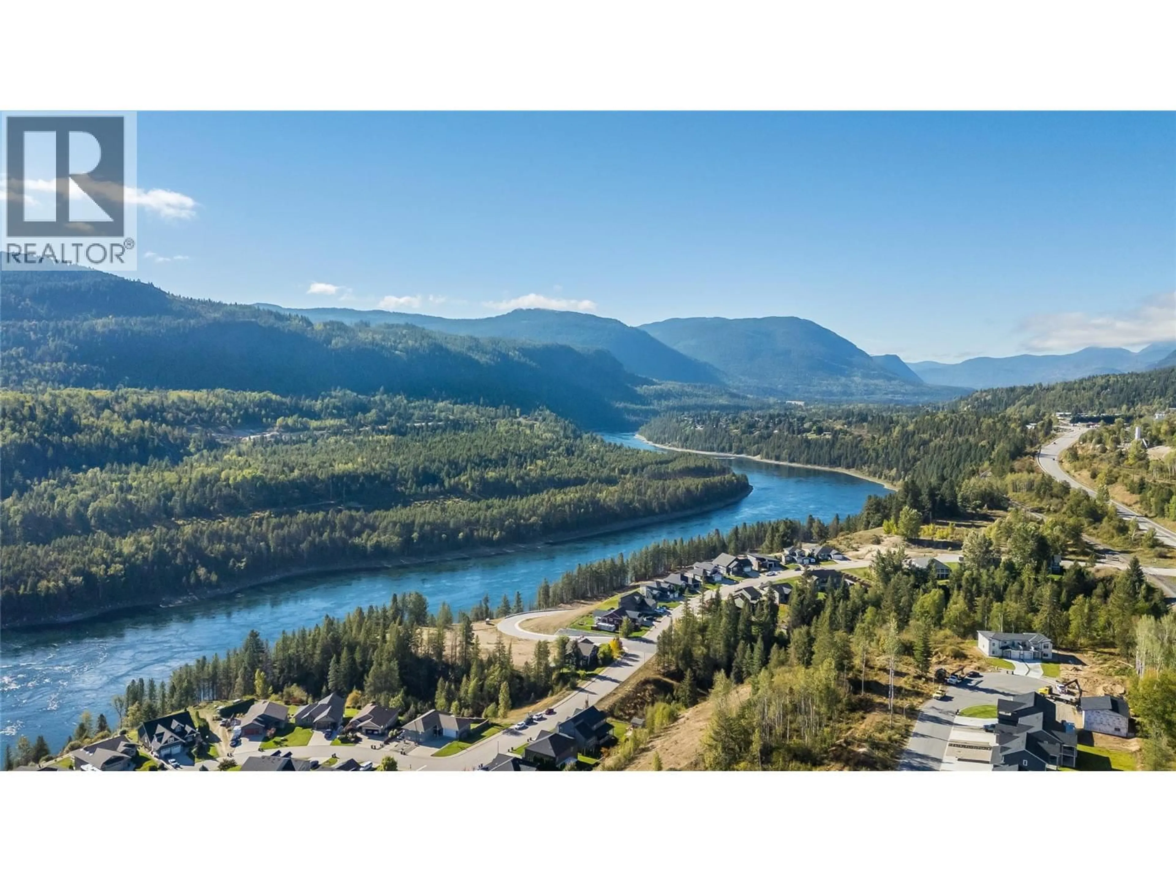 A pic from outside/outdoor area/front of a property/back of a property/a pic from drone, water/lake/river/ocean view for 3732 5TH AVENUE, Castlegar British Columbia V1N4Y4