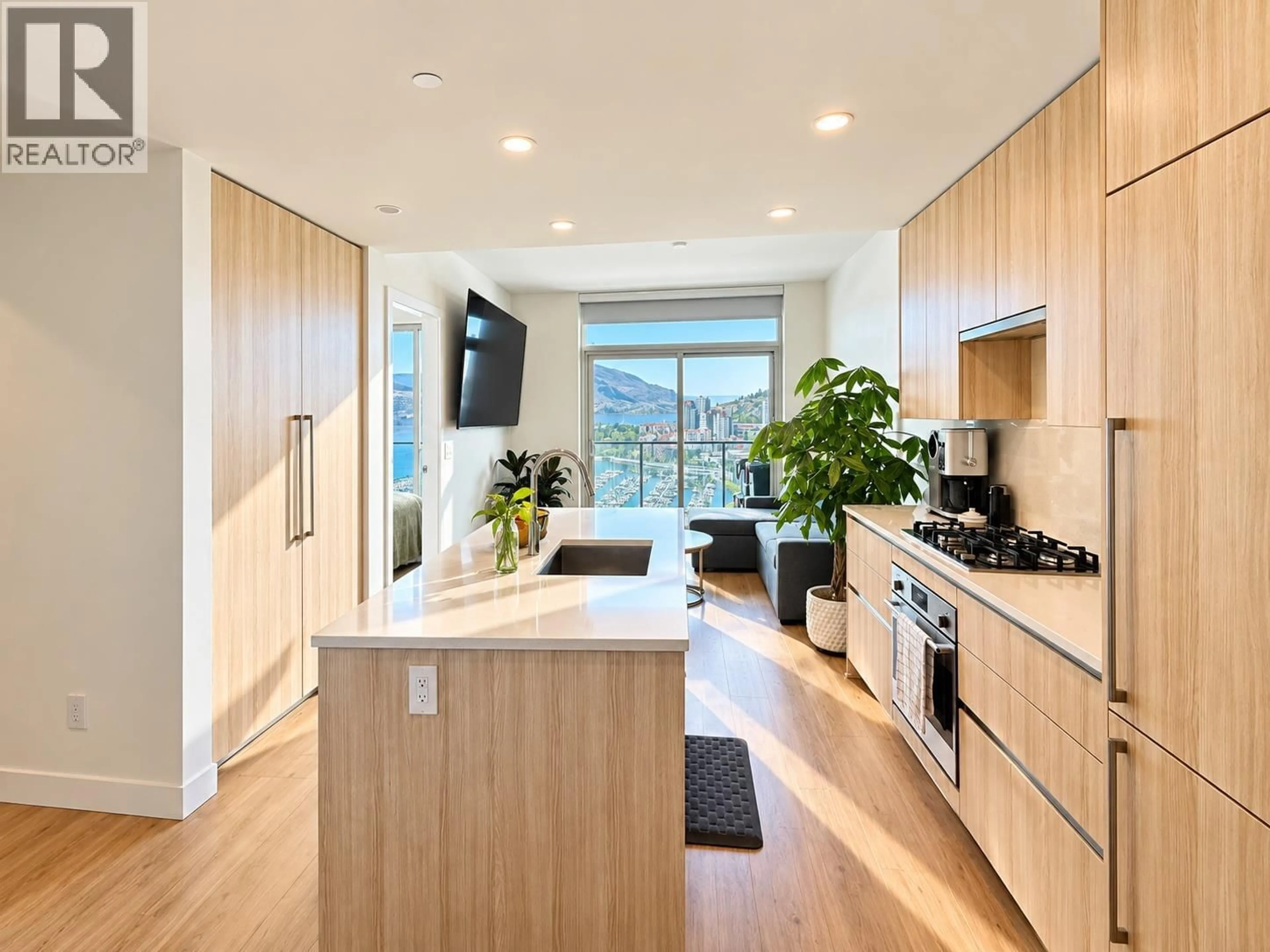 Contemporary kitchen, wood/laminate floor for 1901 - 238 LEON AVENUE, Kelowna British Columbia V1Y6H9