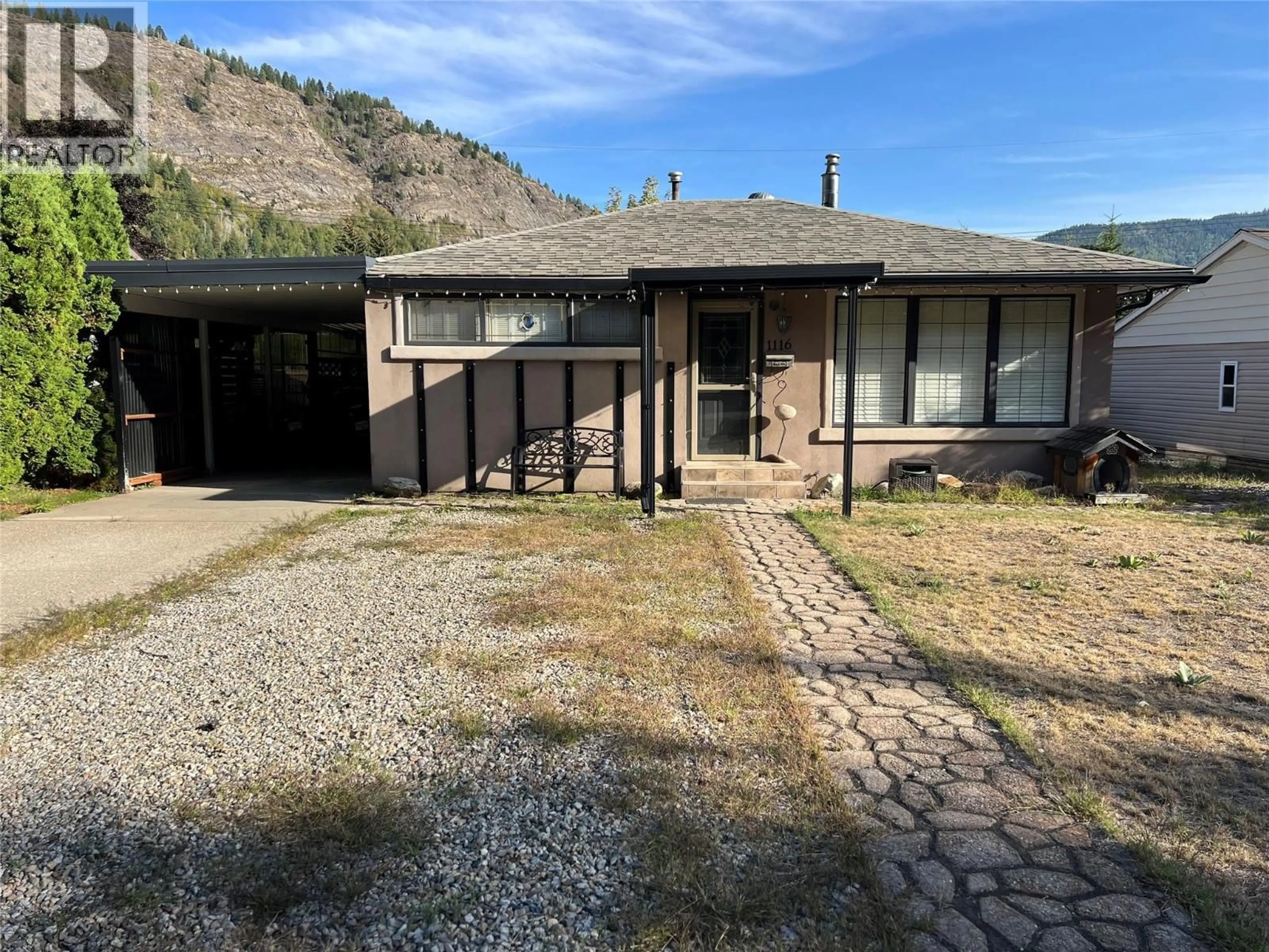 A pic from outside/outdoor area/front of a property/back of a property/a pic from drone, unknown for 1116 MARIANNA CRESCENT, Trail British Columbia V1R1C7
