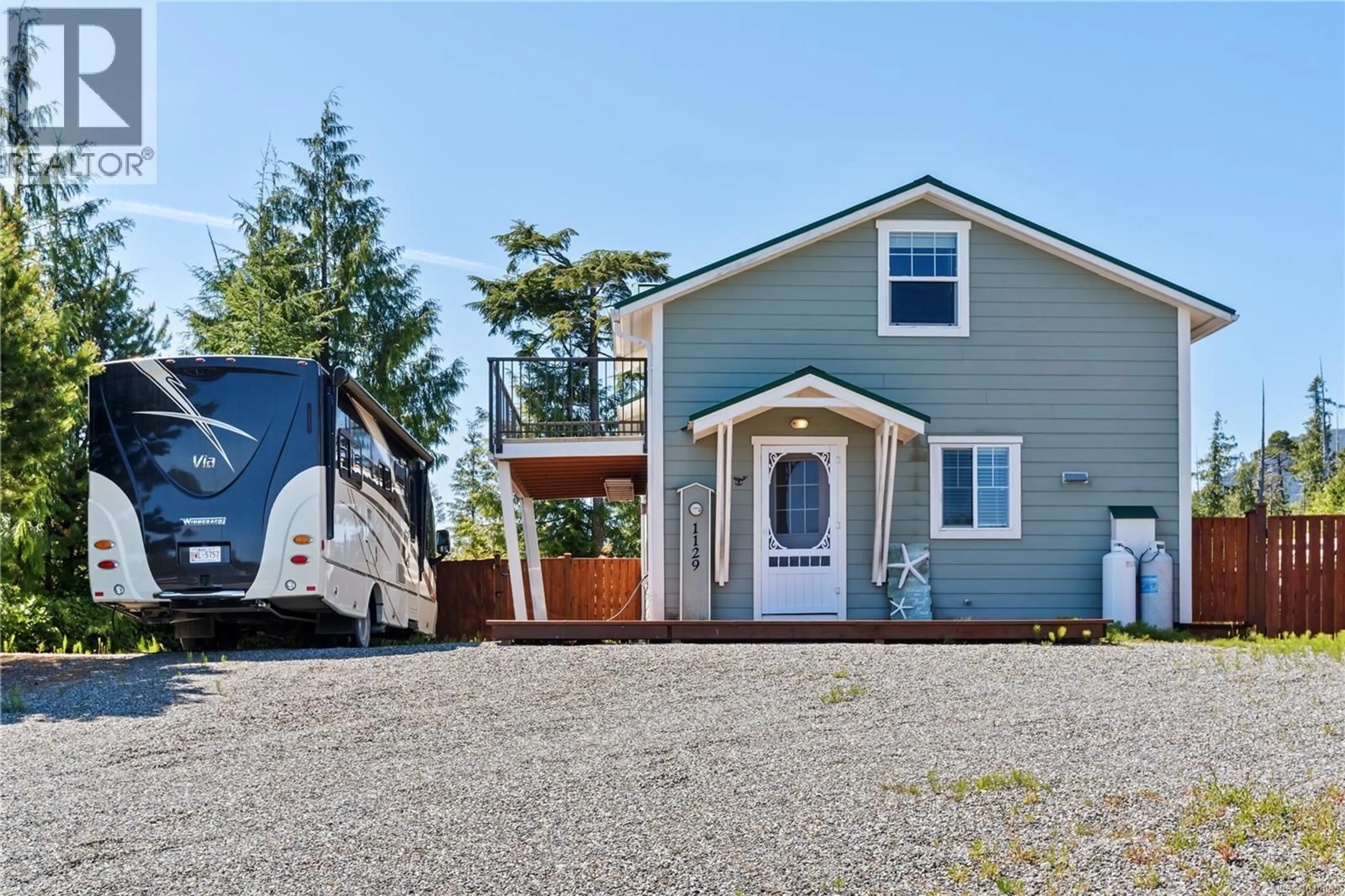 Home with vinyl exterior material, street for 1129 FIFTH AVENUE, Ucluelet British Columbia V0R3A0