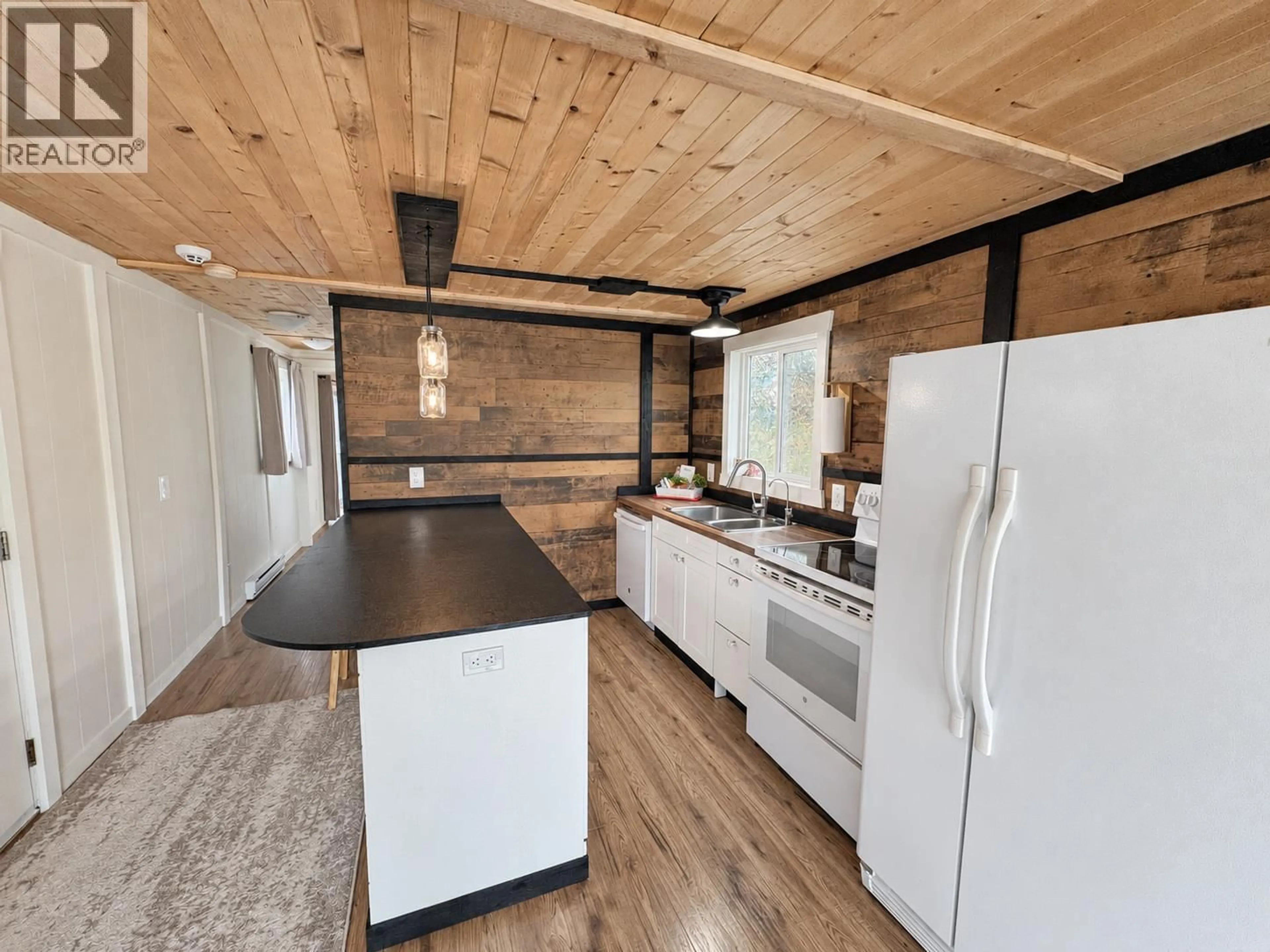 Open concept kitchen, wood/laminate floor for 13 - 851 OLD NORTH THOMPSON HIGHWAY, Clearwater British Columbia V0E1N2