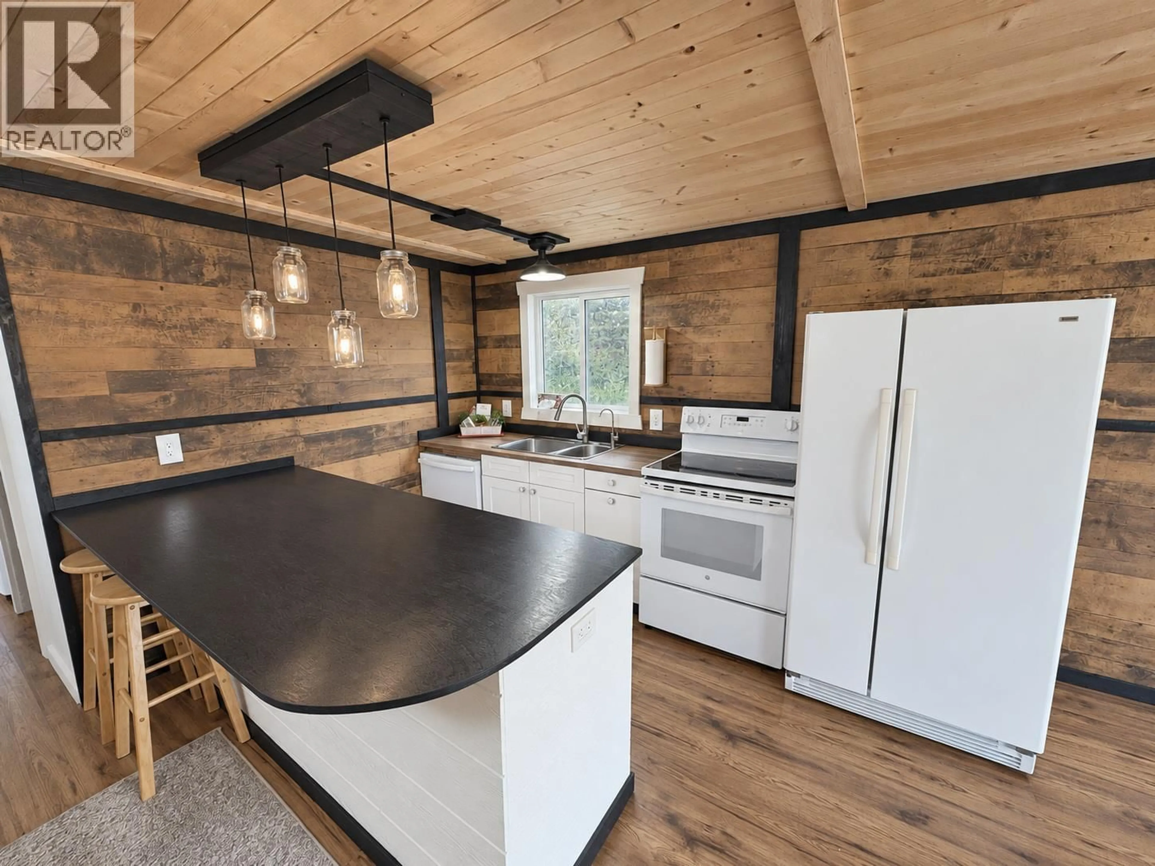 Open concept kitchen, wood/laminate floor for 13 - 851 OLD NORTH THOMPSON HIGHWAY, Clearwater British Columbia V0E1N2