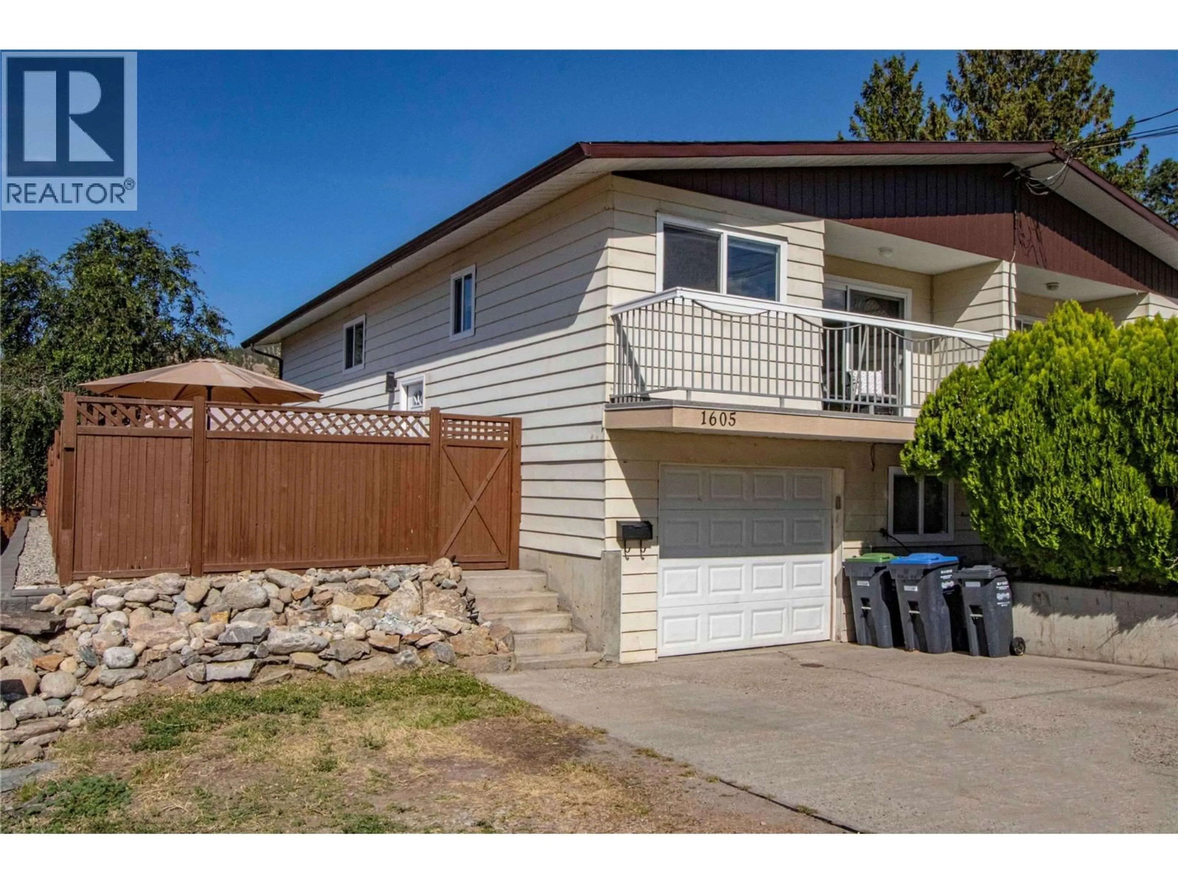 Home with vinyl exterior material, street for 1605 CARMI AVENUE, Penticton British Columbia V2A6Y1