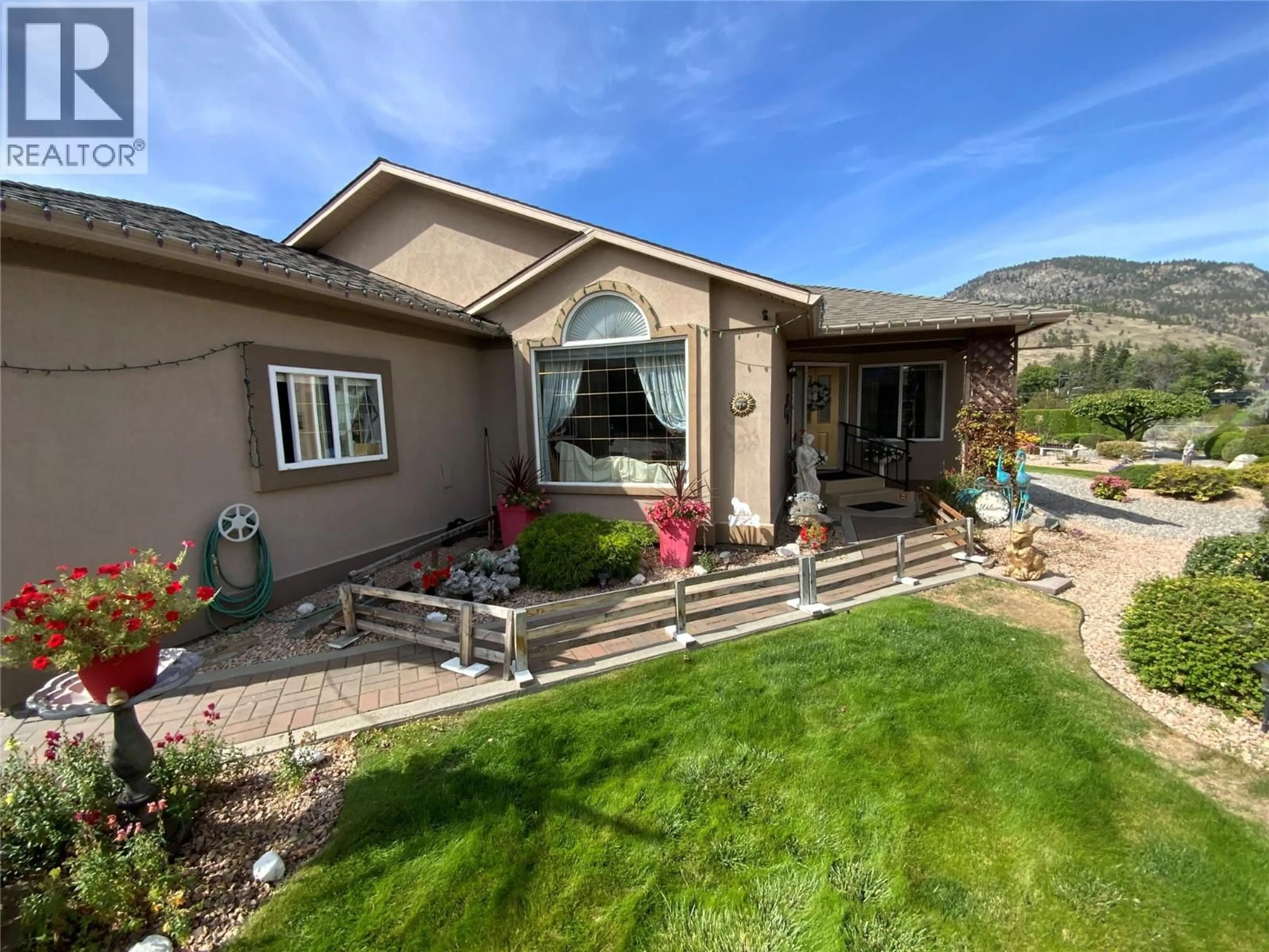 Home with vinyl exterior material, mountain view for 437 RIDGE ROAD, Penticton British Columbia V2A8N7
