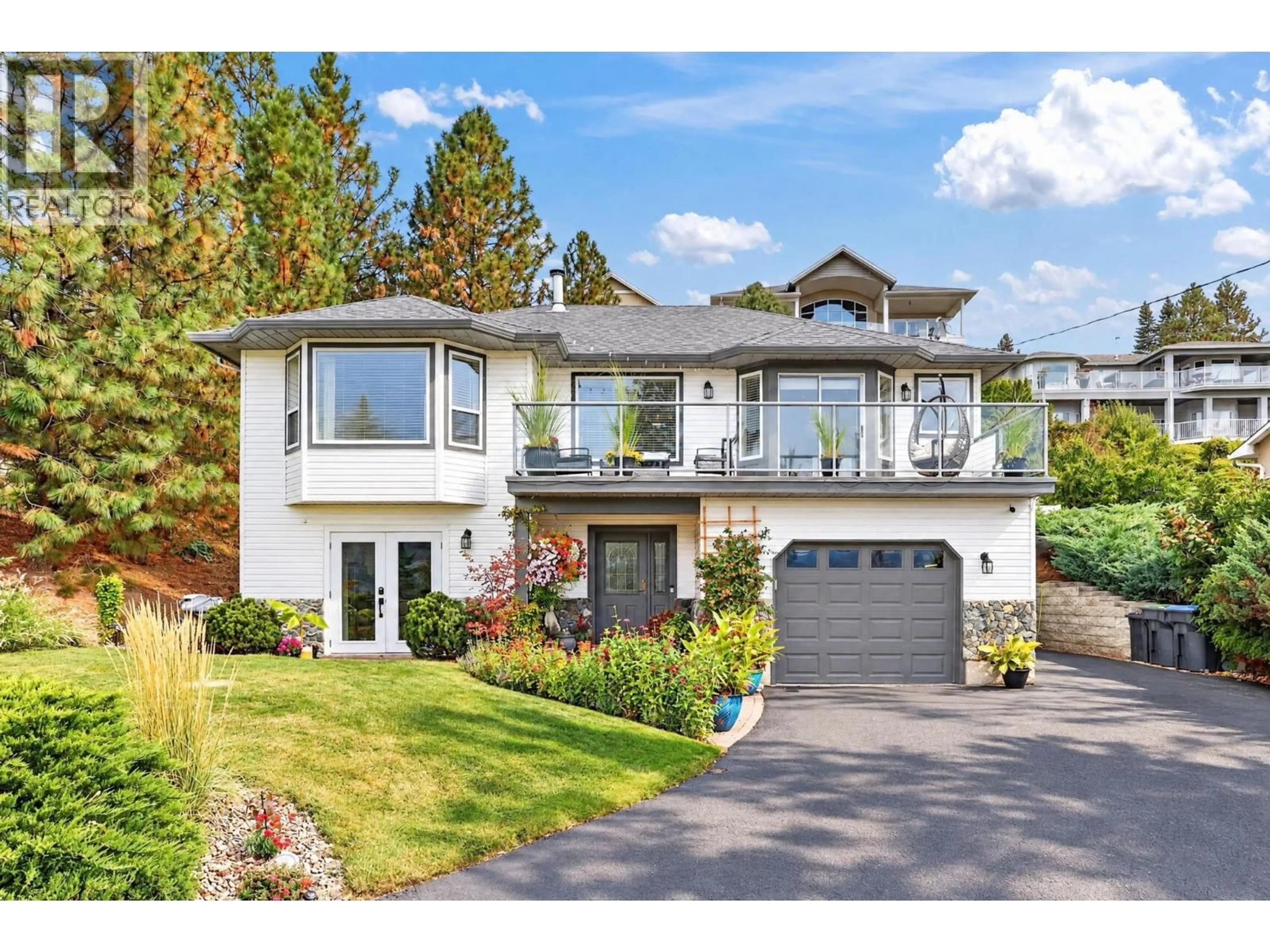 Home with vinyl exterior material, street for 5290 CLARENCE ROAD, Peachland British Columbia V0H1X2
