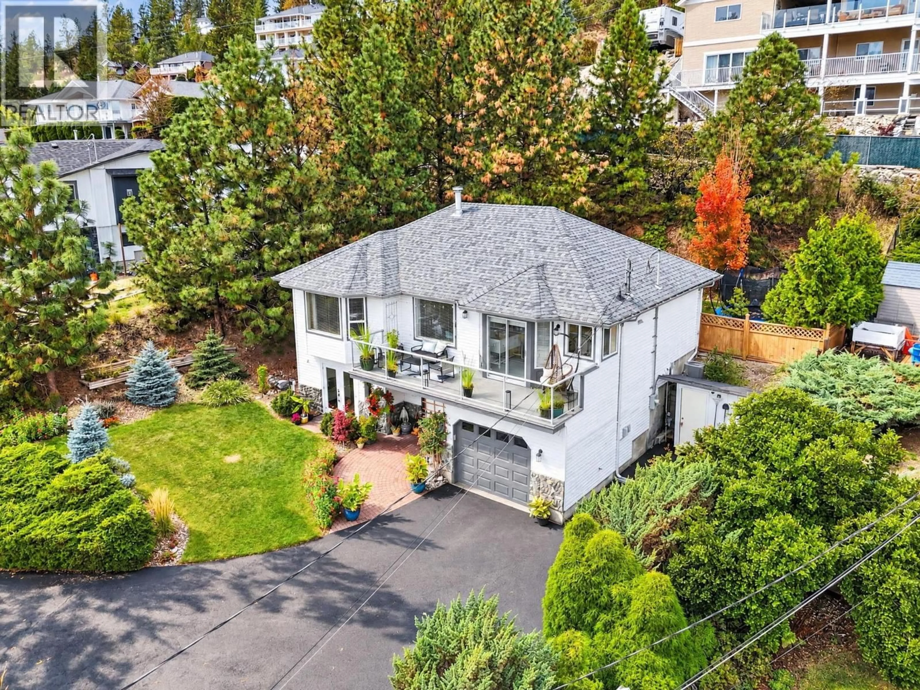 A pic from outside/outdoor area/front of a property/back of a property/a pic from drone, street for 5290 CLARENCE ROAD, Peachland British Columbia V0H1X2