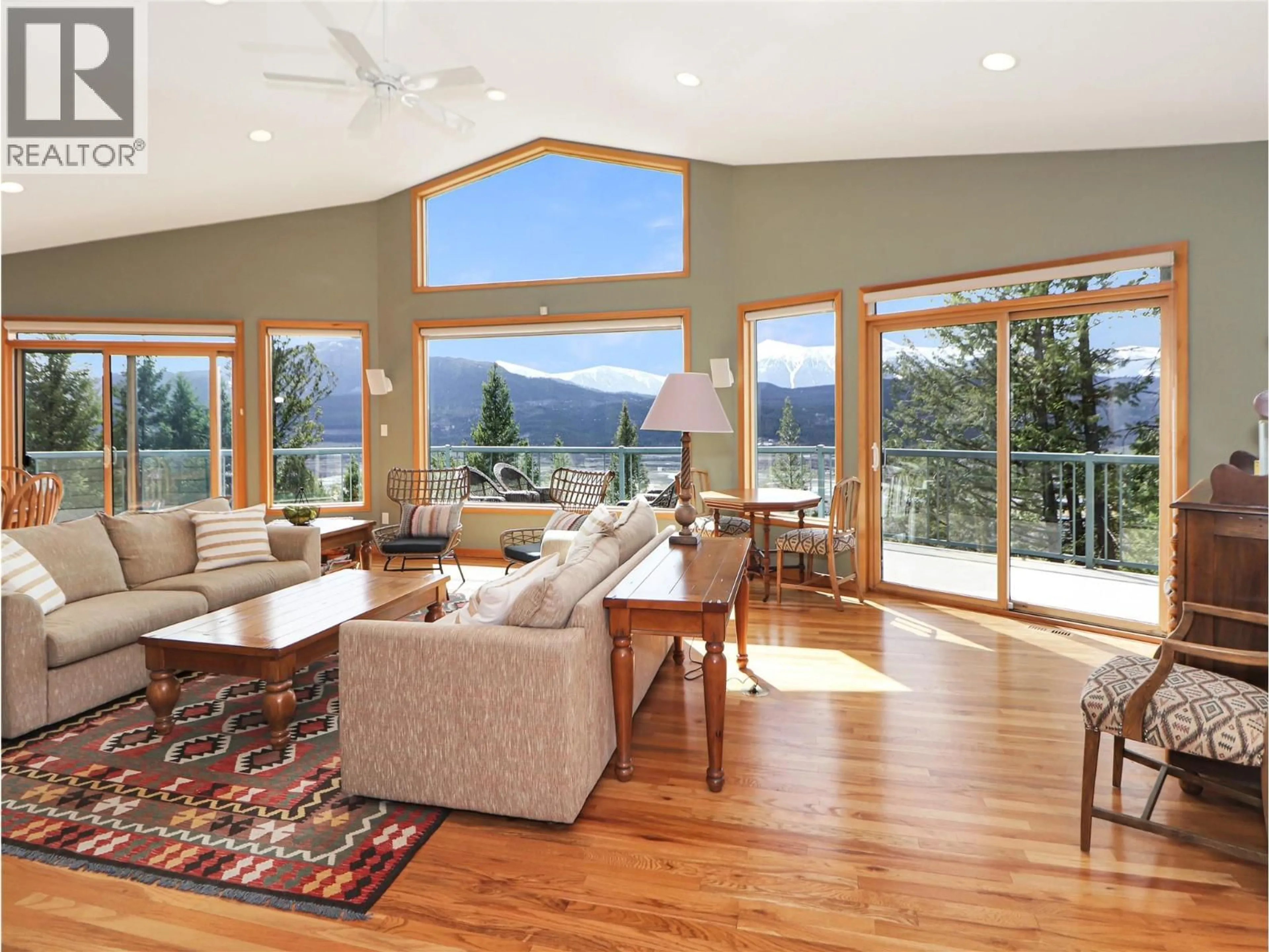 Living room with furniture, wood/laminate floor for 2360/2380 95 HIGHWAY, Spillimacheen British Columbia V0A1P0