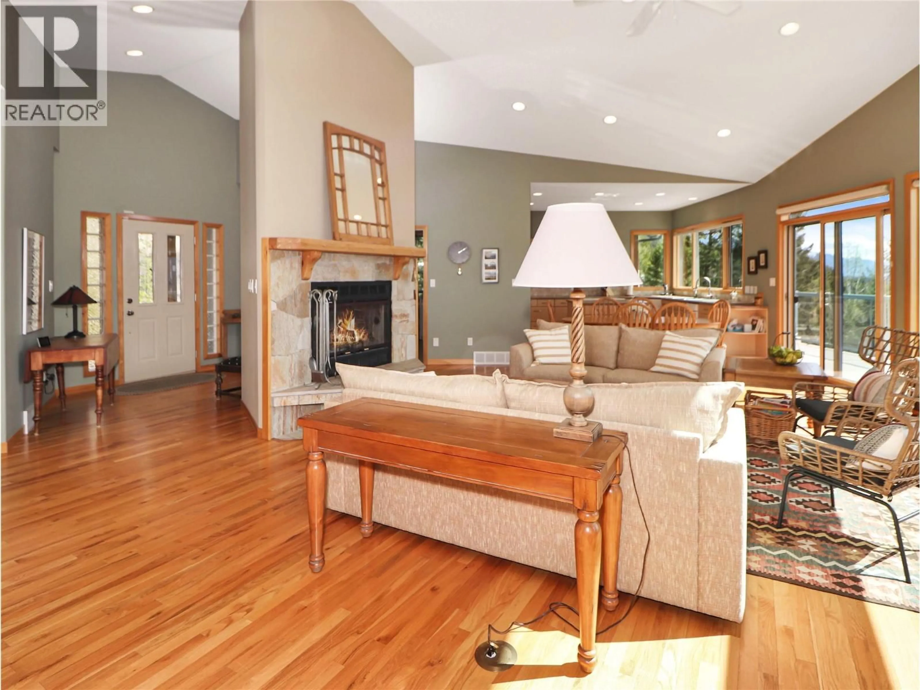 Living room with furniture, wood/laminate floor for 2360/2380 95 HIGHWAY, Spillimacheen British Columbia V0A1P0