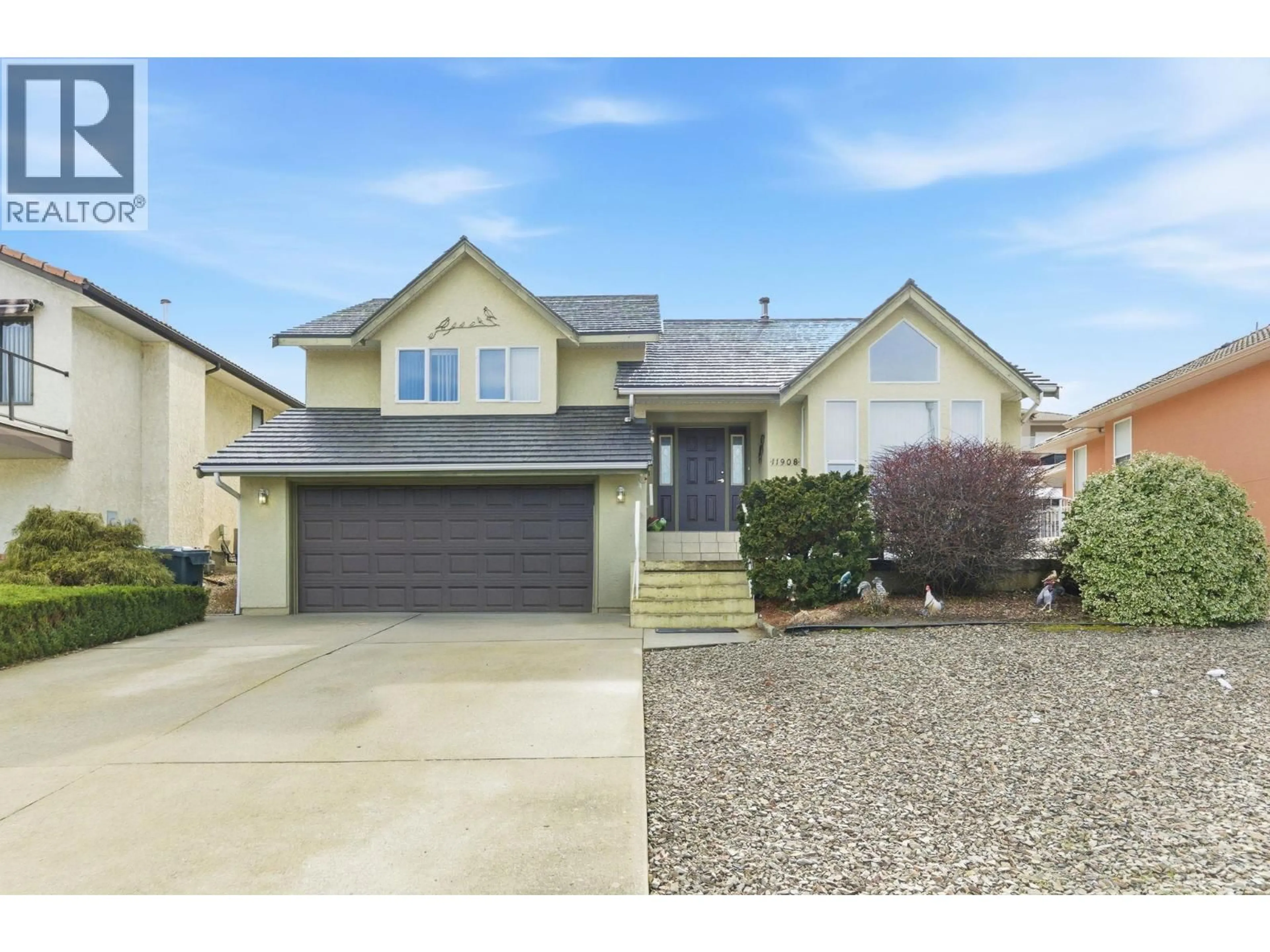 Home with vinyl exterior material, street for 11908 QUAIL RIDGE PLACE, Osoyoos British Columbia V0H1V4