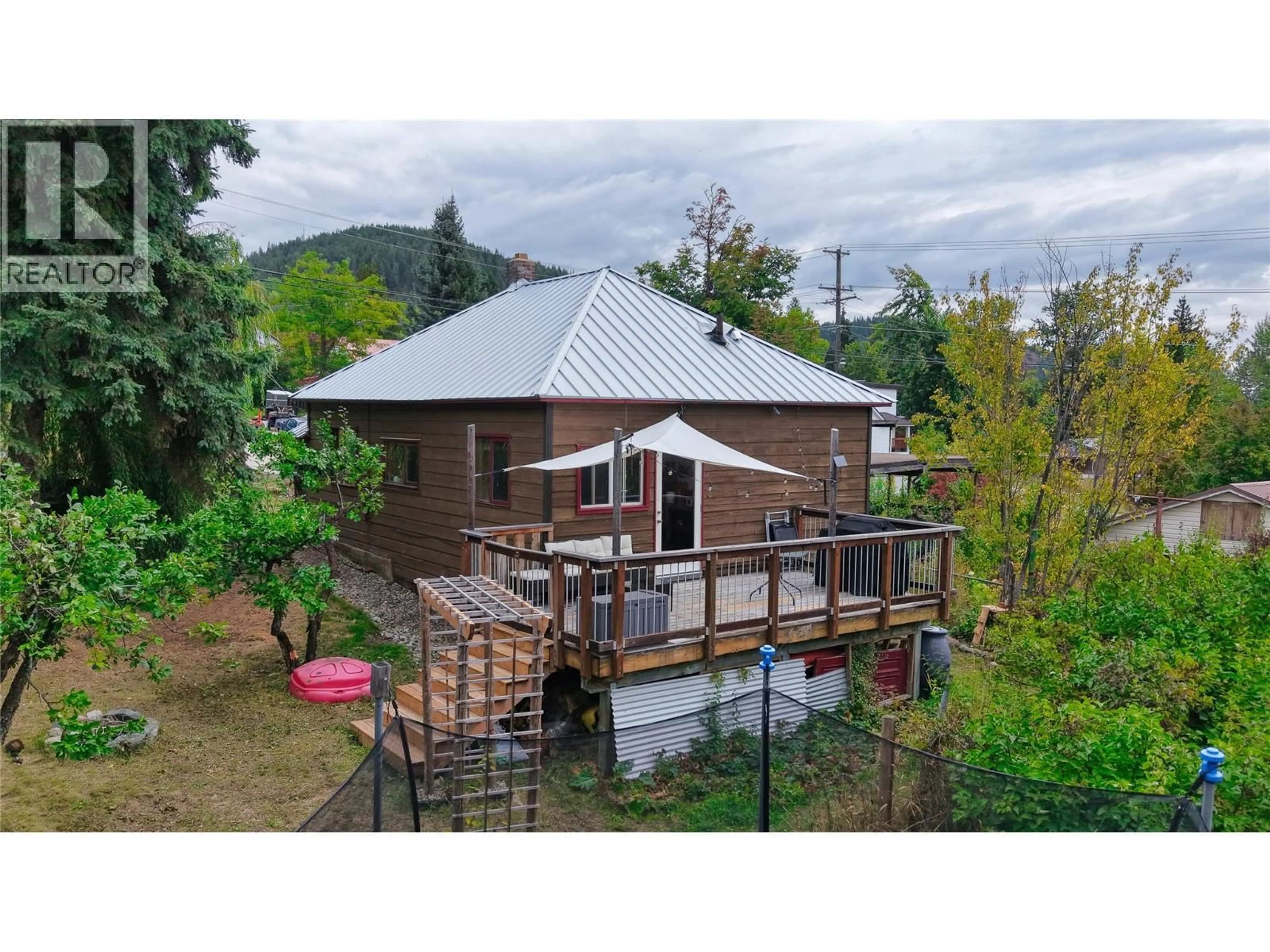 A pic from outside/outdoor area/front of a property/back of a property/a pic from drone, mountain view for 1677 SECOND AVENUE, Rossland British Columbia V0G1Y0