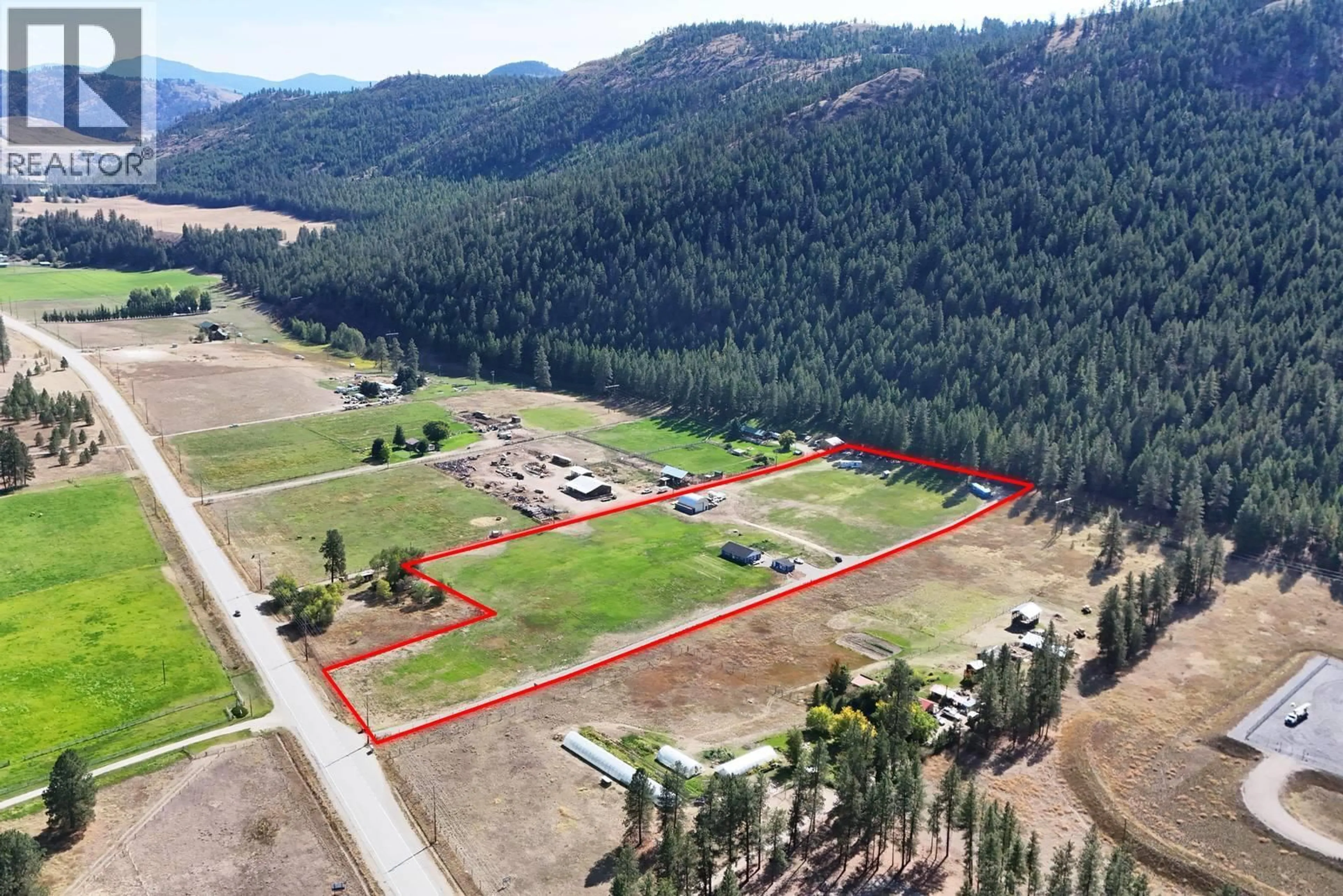 A pic from outside/outdoor area/front of a property/back of a property/a pic from drone, mountain view for 3590 #3 HIGHWAY, Rock Creek British Columbia V0H1Y0