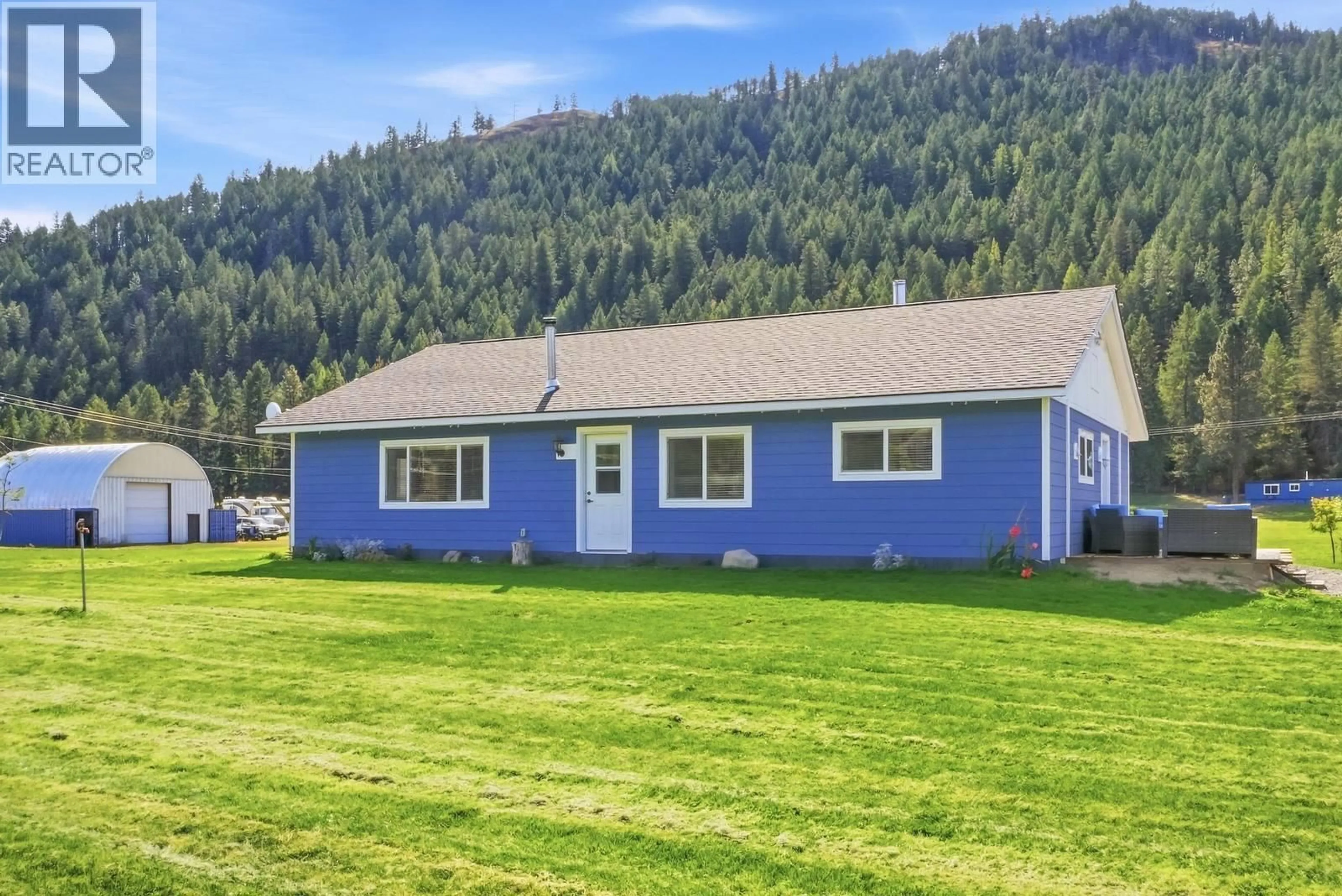 Home with vinyl exterior material, mountain view for 3590 #3 HIGHWAY, Rock Creek British Columbia V0H1Y0
