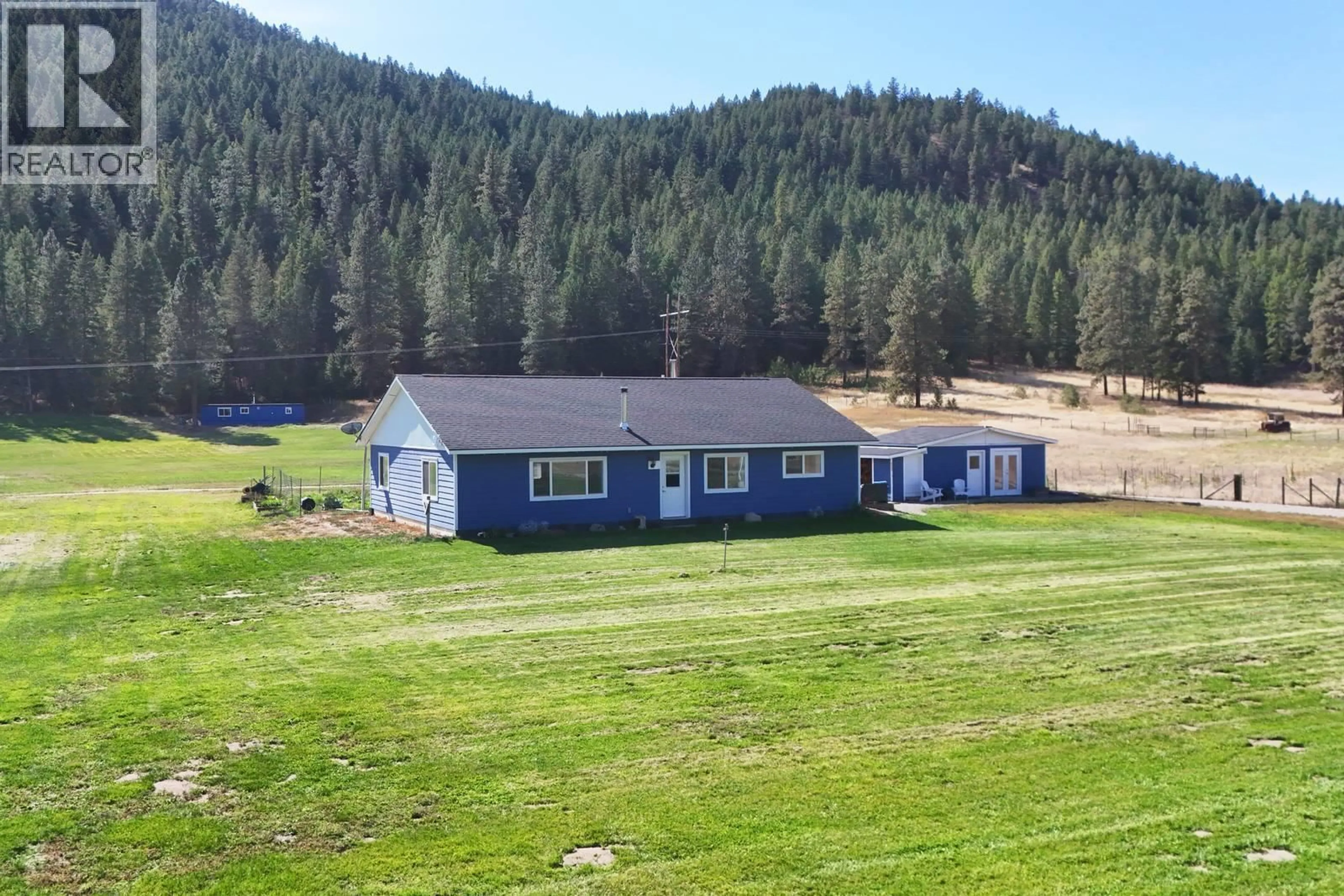 A pic from outside/outdoor area/front of a property/back of a property/a pic from drone, mountain view for 3590 #3 HIGHWAY, Rock Creek British Columbia V0H1Y0