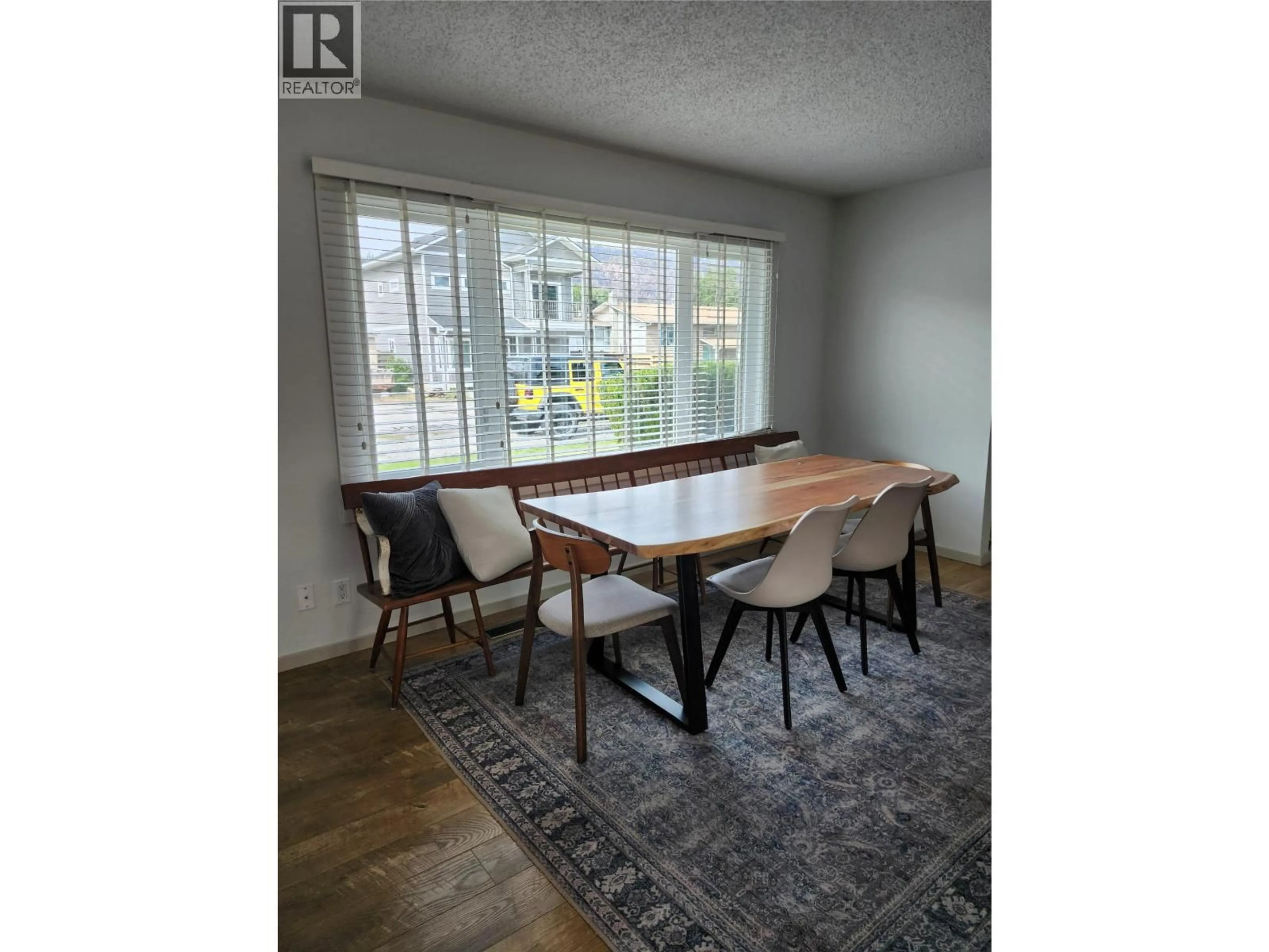 Dining room, wood/laminate floor for 12261 SAUNDERS CRESCENT, Summerland British Columbia V0H1Z9