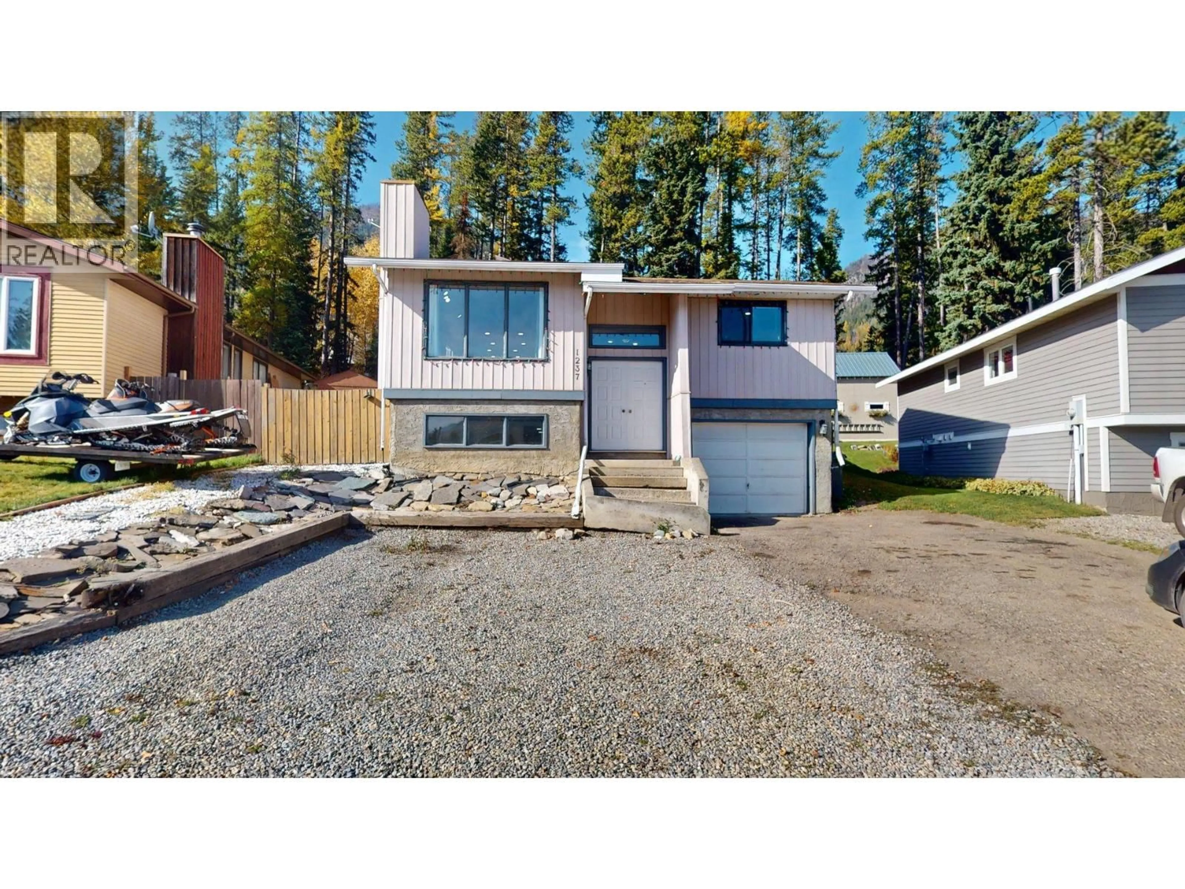 Home with vinyl exterior material, street for 1237 PINYON ROAD, Sparwood British Columbia V0B2G2