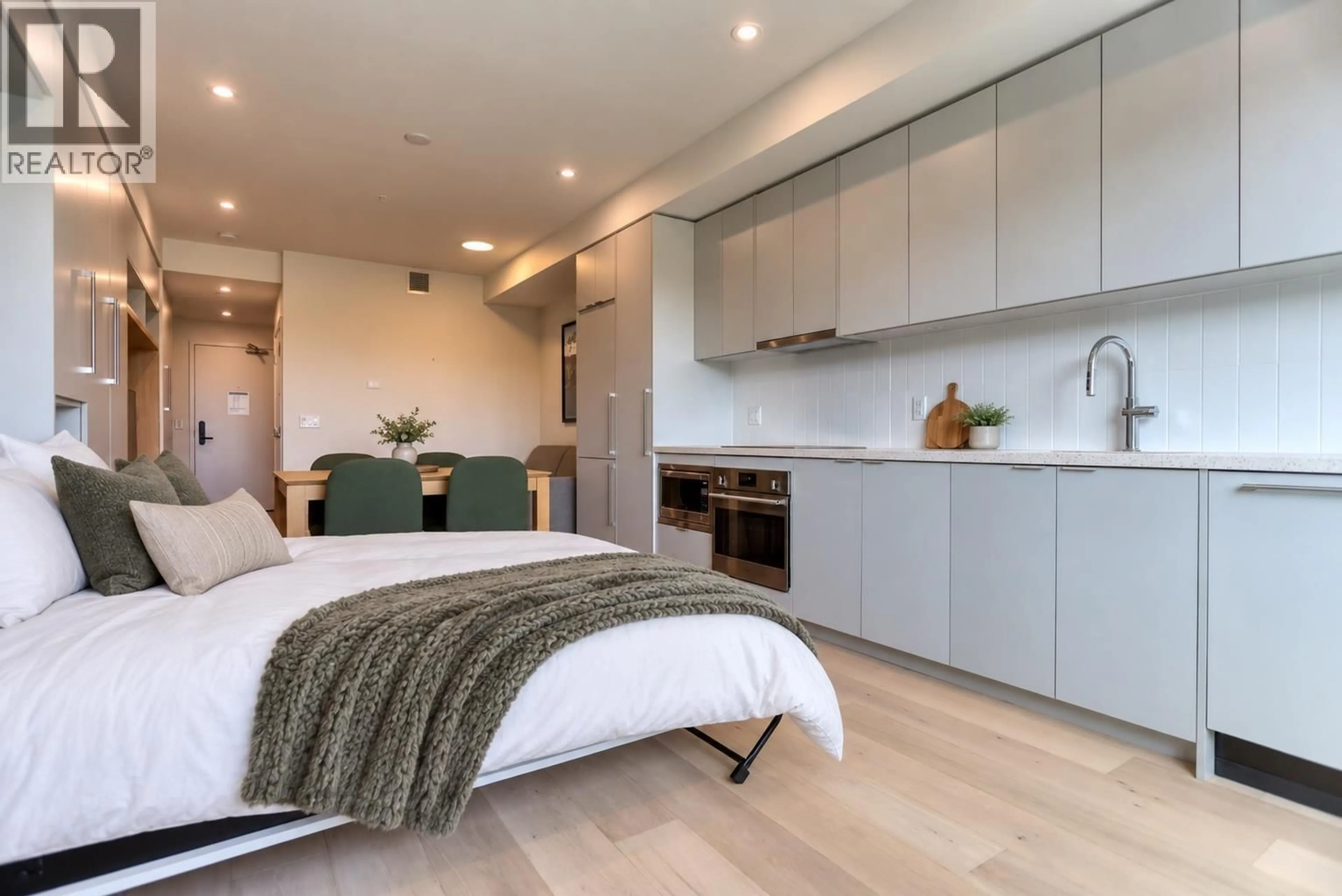 Bedroom with bed, wood/laminate floor for 319 - 4280 RED MOUNTAIN ROAD, Rossland British Columbia V0G1Y0