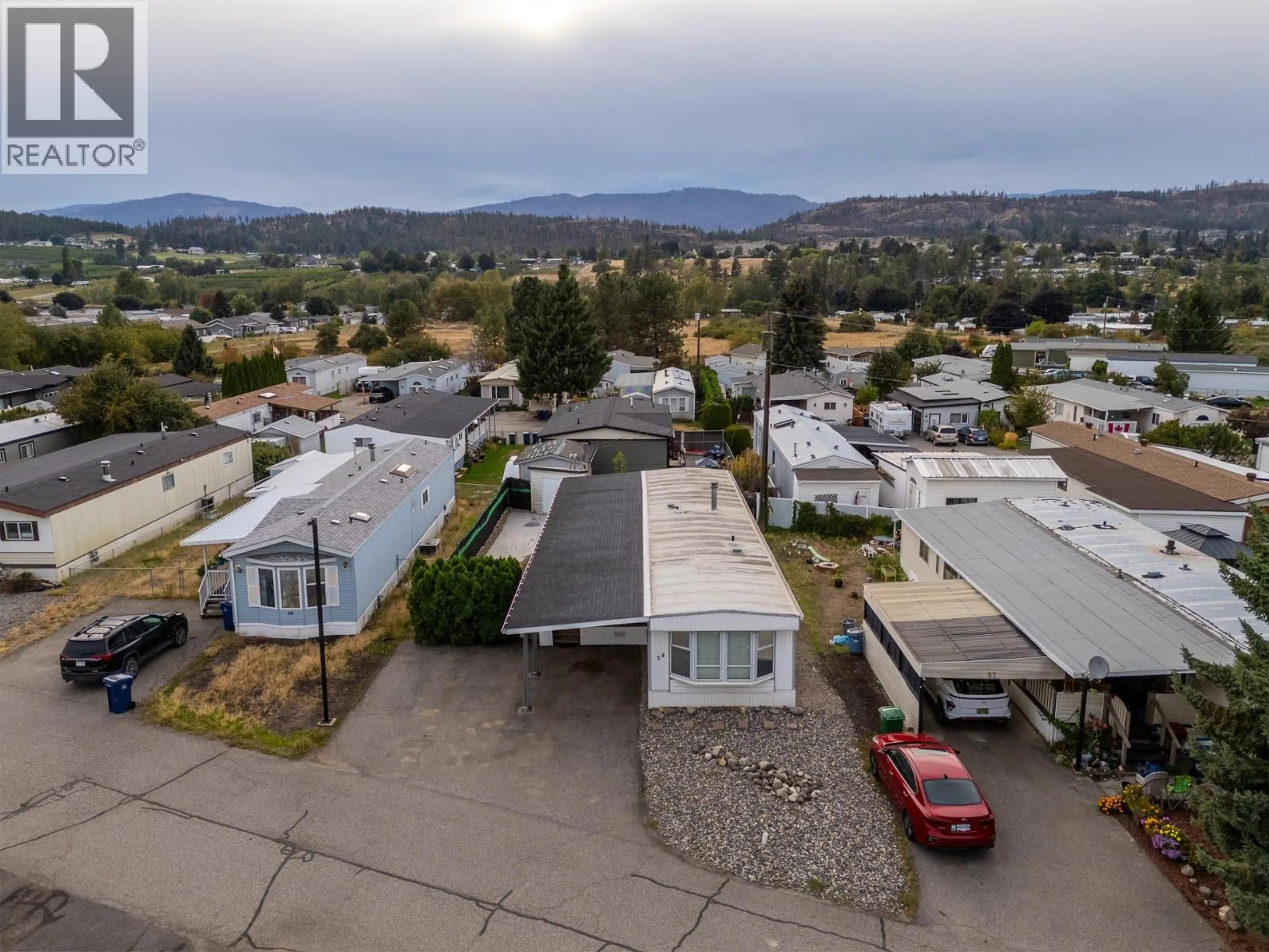 A pic from outside/outdoor area/front of a property/back of a property/a pic from drone, mountain view for 58 - 9020 JIM BAILEY ROAD, Kelowna British Columbia V4V1E5