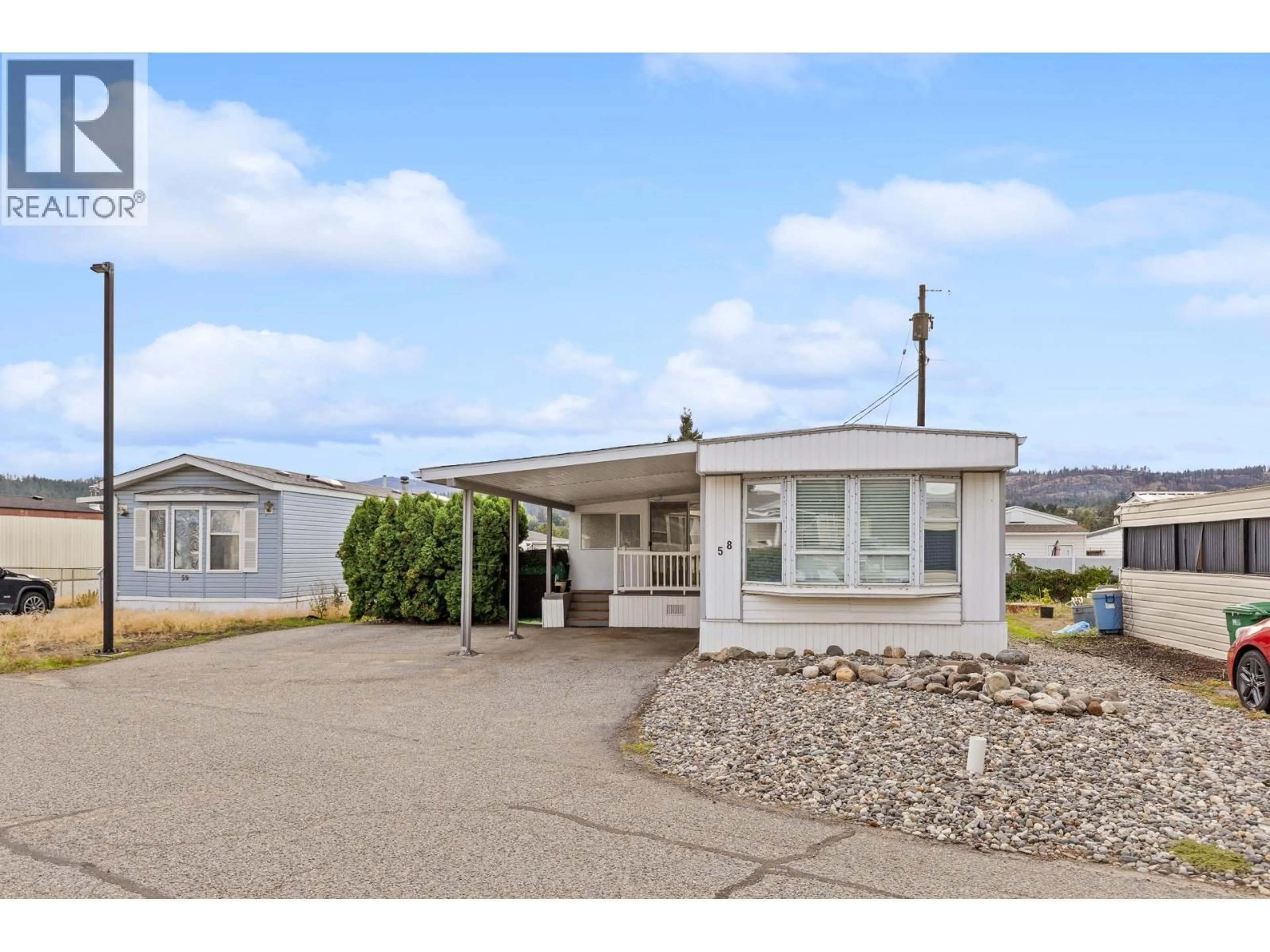Home with vinyl exterior material, mountain view for 58 - 9020 JIM BAILEY ROAD, Kelowna British Columbia V4V1E5