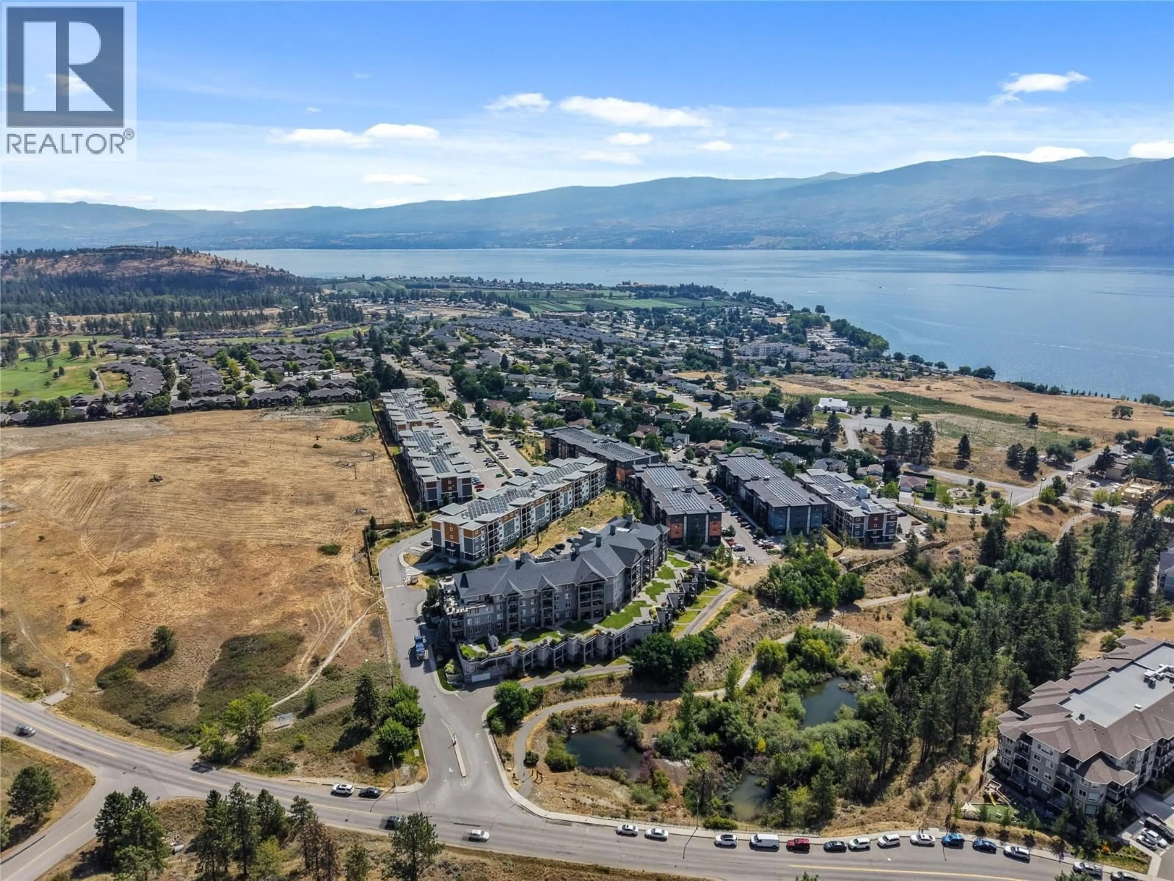 A pic from outside/outdoor area/front of a property/back of a property/a pic from drone, mountain view for 310 - 3645 CARRINGTON ROAD, West Kelowna British Columbia V4T3G9