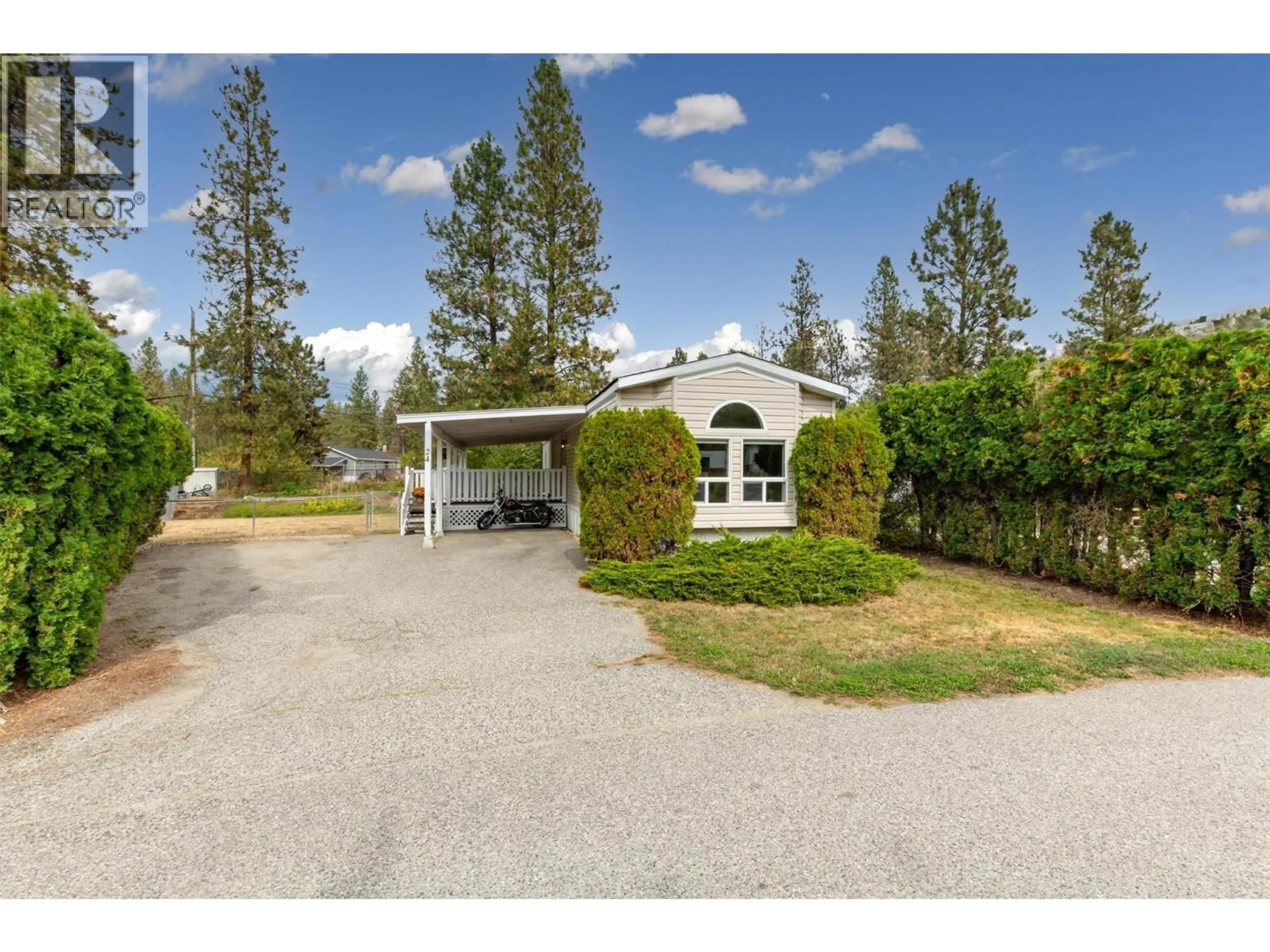A pic from outside/outdoor area/front of a property/back of a property/a pic from drone, street for 24 - 3585 ELK ROAD, Westbank British Columbia V4T1R5