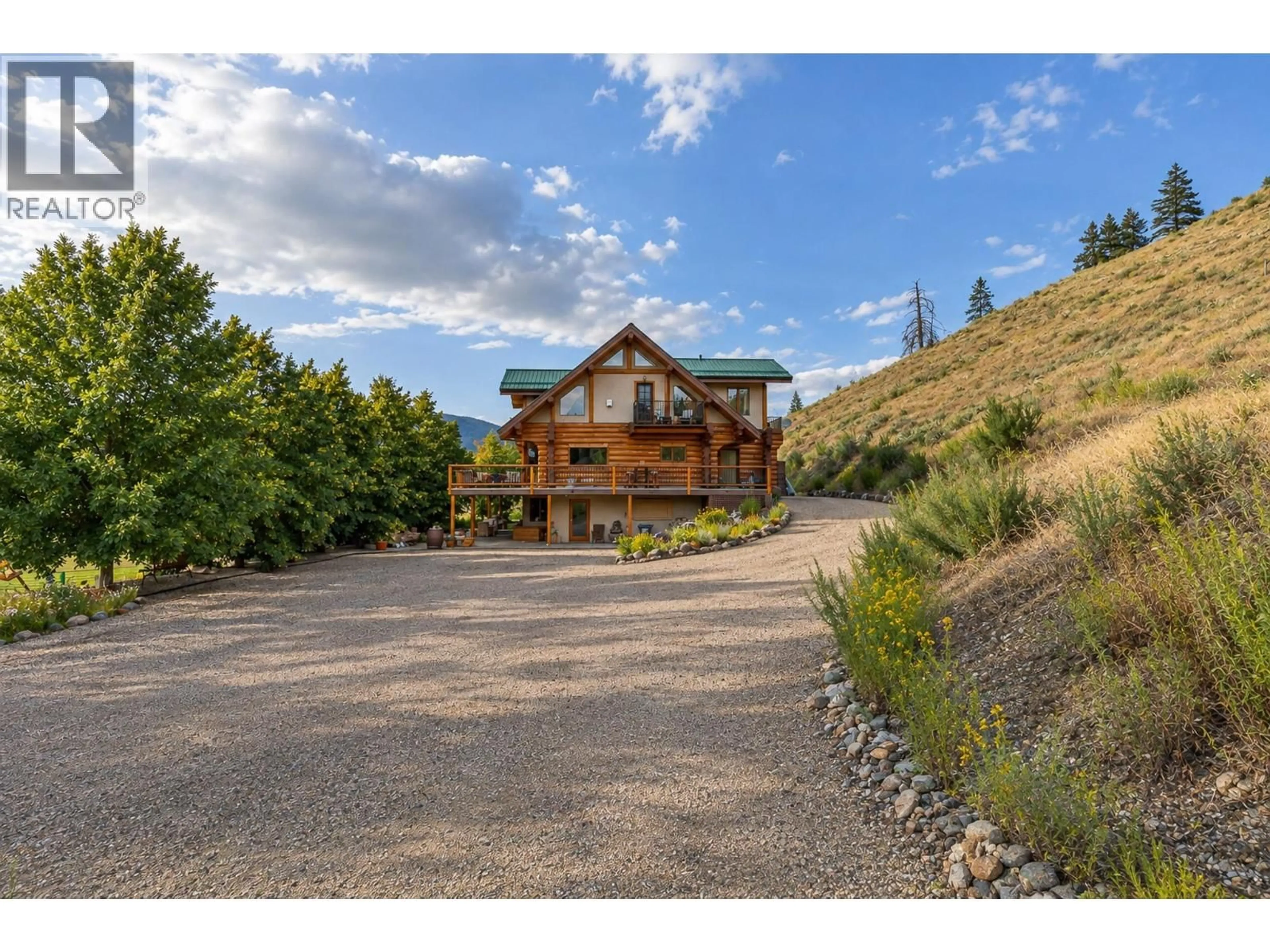 A pic from outside/outdoor area/front of a property/back of a property/a pic from drone, mountain view for 1225 ROUND LAKE ROAD, Armstrong British Columbia V0E1B5