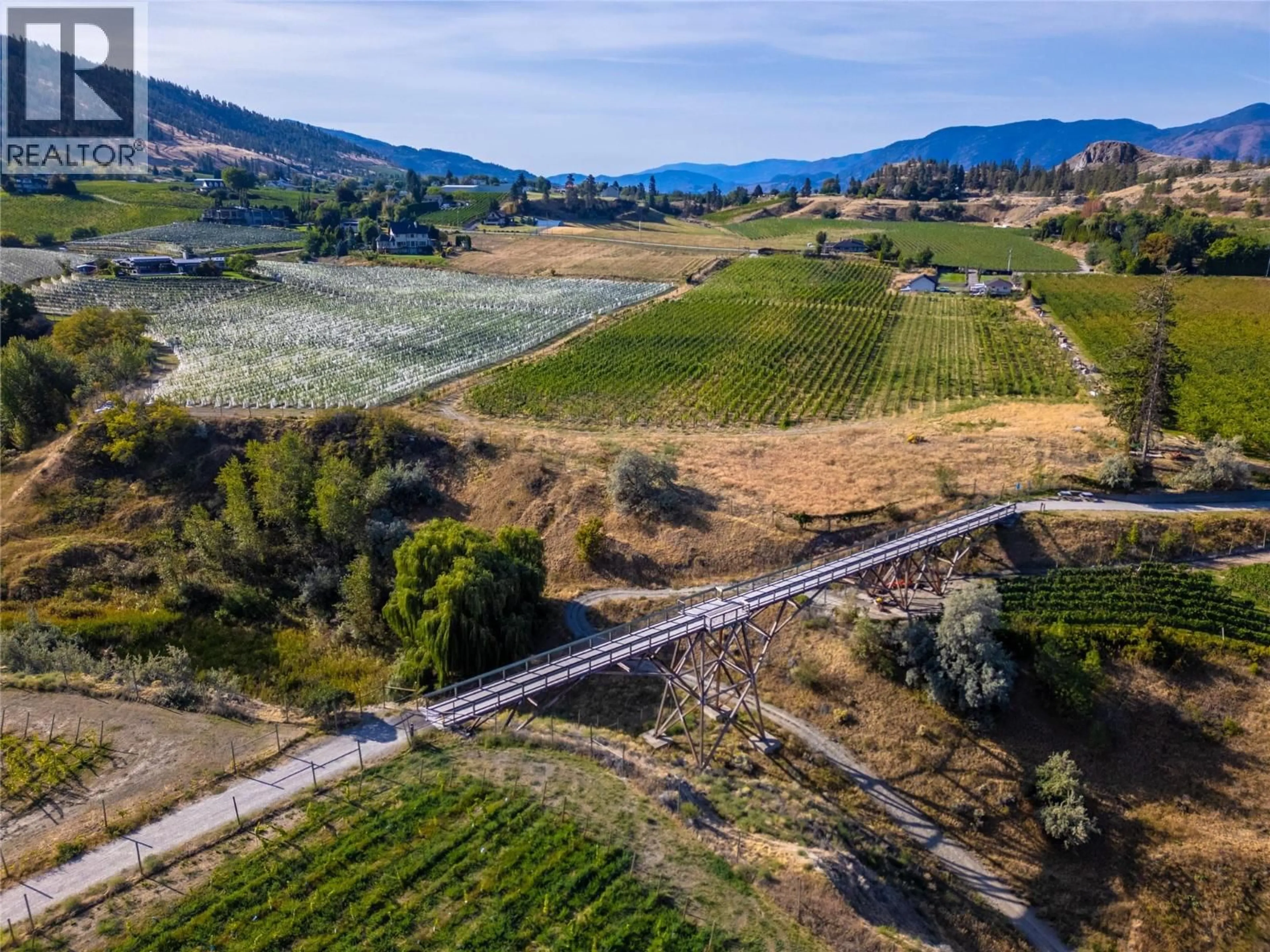 A pic from outside/outdoor area/front of a property/back of a property/a pic from drone, mountain view for 823 SWORDER ROAD, Penticton British Columbia V2A8V2