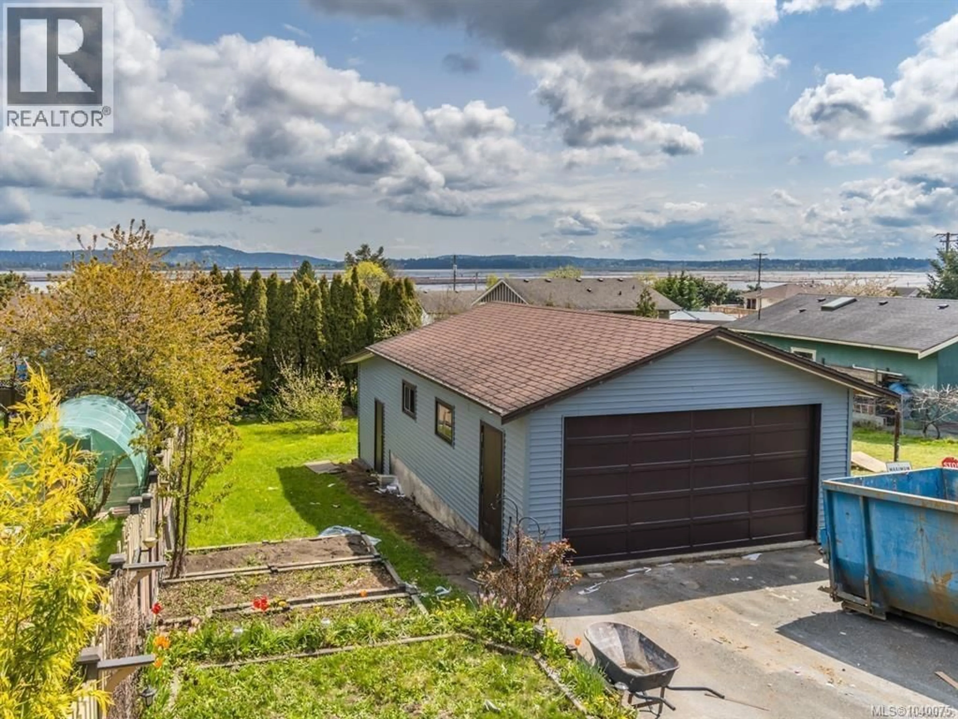 A pic from outside/outdoor area/front of a property/back of a property/a pic from drone, water/lake/river/ocean view for 18 GILLESPIE STREET SOUTH, Nanaimo British Columbia V9R4Y3